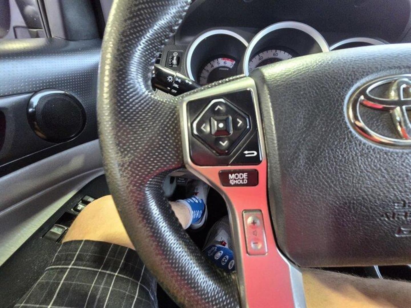 2015 Super White Toyota Tacoma (5TFUX4EN8FX) with an 2.7L I4 159hp 180ft. lbs. engine, Automatic transmission, located at 25355 Eames Street, Channahon, IL, 60410, (815) 467-1807, 41.429108, -88.228432 - This 2015 Toyota Tacoma is built to take over the road no apologies. Super White exterior, Graphite interior, and a gutsy 2.7L I4 pumping out 159 horsepower and 180 lb-ft of torque. Its lean, its mean, and itll get you where you need to go with a measured appetite: 18 MPG city and 20 MPG highway. T - Photo#13