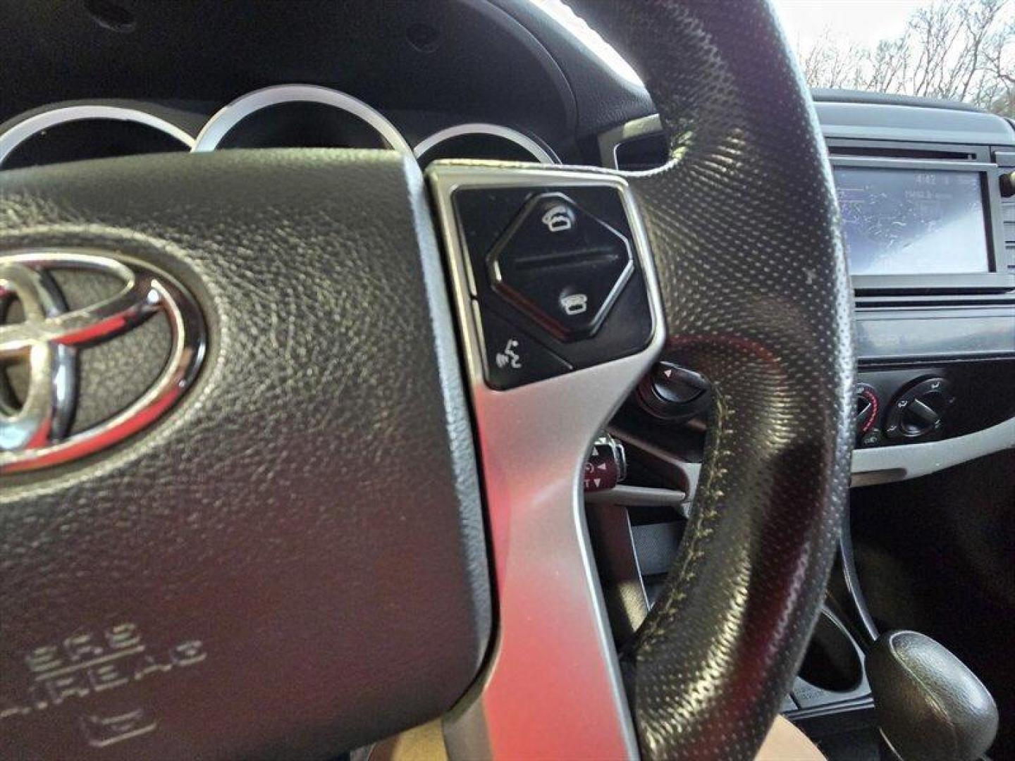 2015 Super White Toyota Tacoma (5TFUX4EN8FX) with an 2.7L I4 159hp 180ft. lbs. engine, Automatic transmission, located at 25355 Eames Street, Channahon, IL, 60410, (815) 467-1807, 41.429108, -88.228432 - This 2015 Toyota Tacoma is built to take over the road no apologies. Super White exterior, Graphite interior, and a gutsy 2.7L I4 pumping out 159 horsepower and 180 lb-ft of torque. Its lean, its mean, and itll get you where you need to go with a measured appetite: 18 MPG city and 20 MPG highway. T - Photo#14