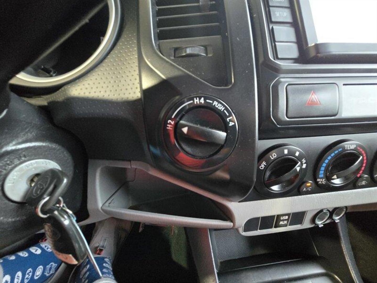 2015 Super White Toyota Tacoma (5TFUX4EN8FX) with an 2.7L I4 159hp 180ft. lbs. engine, Automatic transmission, located at 25355 Eames Street, Channahon, IL, 60410, (815) 467-1807, 41.429108, -88.228432 - This 2015 Toyota Tacoma is built to take over the road no apologies. Super White exterior, Graphite interior, and a gutsy 2.7L I4 pumping out 159 horsepower and 180 lb-ft of torque. Its lean, its mean, and itll get you where you need to go with a measured appetite: 18 MPG city and 20 MPG highway. T - Photo#16