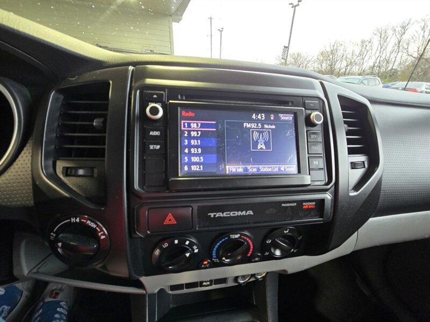 2015 Super White Toyota Tacoma (5TFUX4EN8FX) with an 2.7L I4 159hp 180ft. lbs. engine, Automatic transmission, located at 25355 Eames Street, Channahon, IL, 60410, (815) 467-1807, 41.429108, -88.228432 - This 2015 Toyota Tacoma is built to take over the road no apologies. Super White exterior, Graphite interior, and a gutsy 2.7L I4 pumping out 159 horsepower and 180 lb-ft of torque. Its lean, its mean, and itll get you where you need to go with a measured appetite: 18 MPG city and 20 MPG highway. T - Photo#17