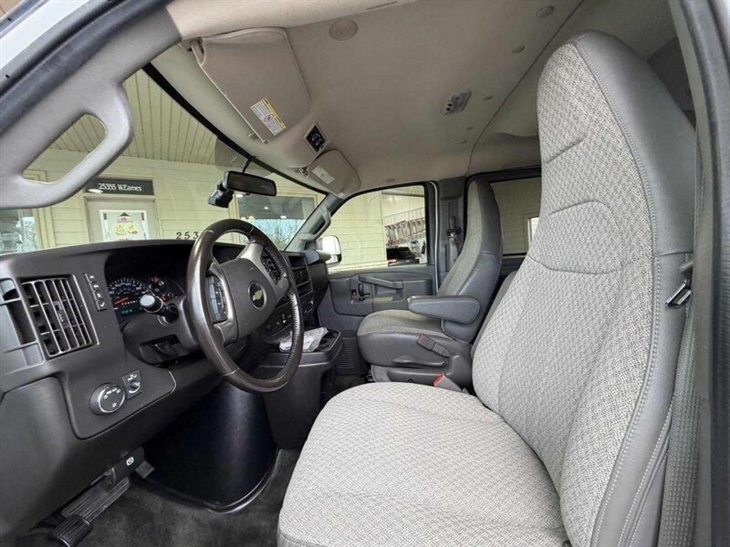 2018 Summit White Chevrolet Express LT Passenger (1GAWGFFG6J1) with an Vortec 6.0L Flex Fuel V8 342hp 373ft. lbs. engine, Automatic transmission, located at 25355 Eames Street, Channahon, IL, 60410, (815) 467-1807, 41.429108, -88.228432 - 2018 Chevrolet Express 2500 LT Summit White exterior / Medium Pewter interior This 2018 Chevrolet Express 2500 LT is powered by the factory Vortec 6.0L FlexFuel V8 (342 hp, 373 lb-ft). It has exceptionally low mileage under 16,000 miles total, averaging less than 2,000 miles per year and is in e - Photo#11