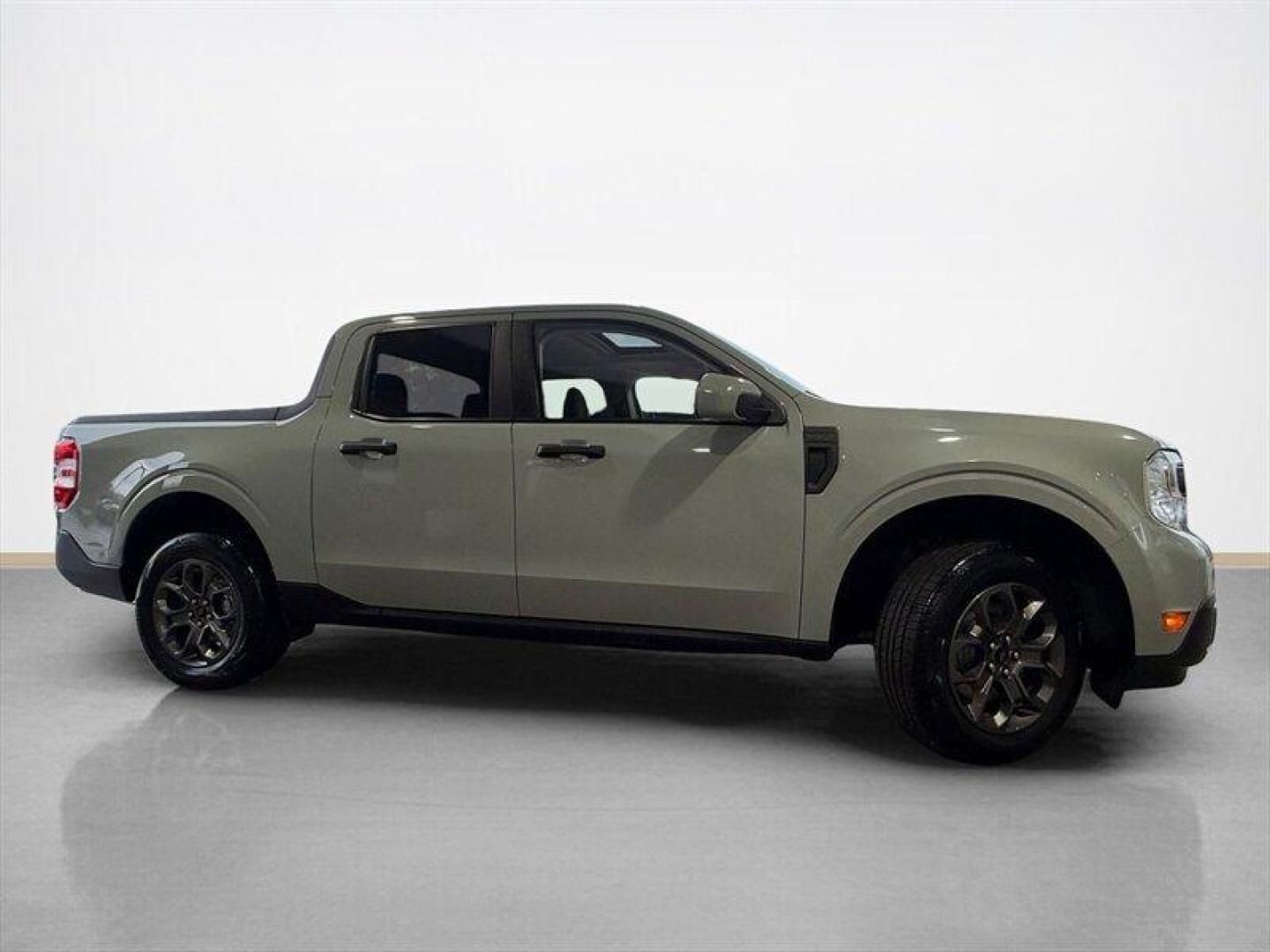 2022 Green Ford Maverick XLT (3FTTW8E3XNR) with an 2.5L Hybrid I4 191hp engine, Automatic transmission, located at 25355 Eames Street, Channahon, IL, 60410, (815) 467-1807, 41.429108, -88.228432 - This is not a commuter its a compact truck that thinks bigger. The 2022 Ford Maverick XLT with the 2.5L Hybrid I-4 and electric assist puts a hard stop on compromise: 191 combined horsepower, blistering efficiency (42 MPG city / 33 MPG highway), and the kind of real-world utility your weeknight her - Photo#1