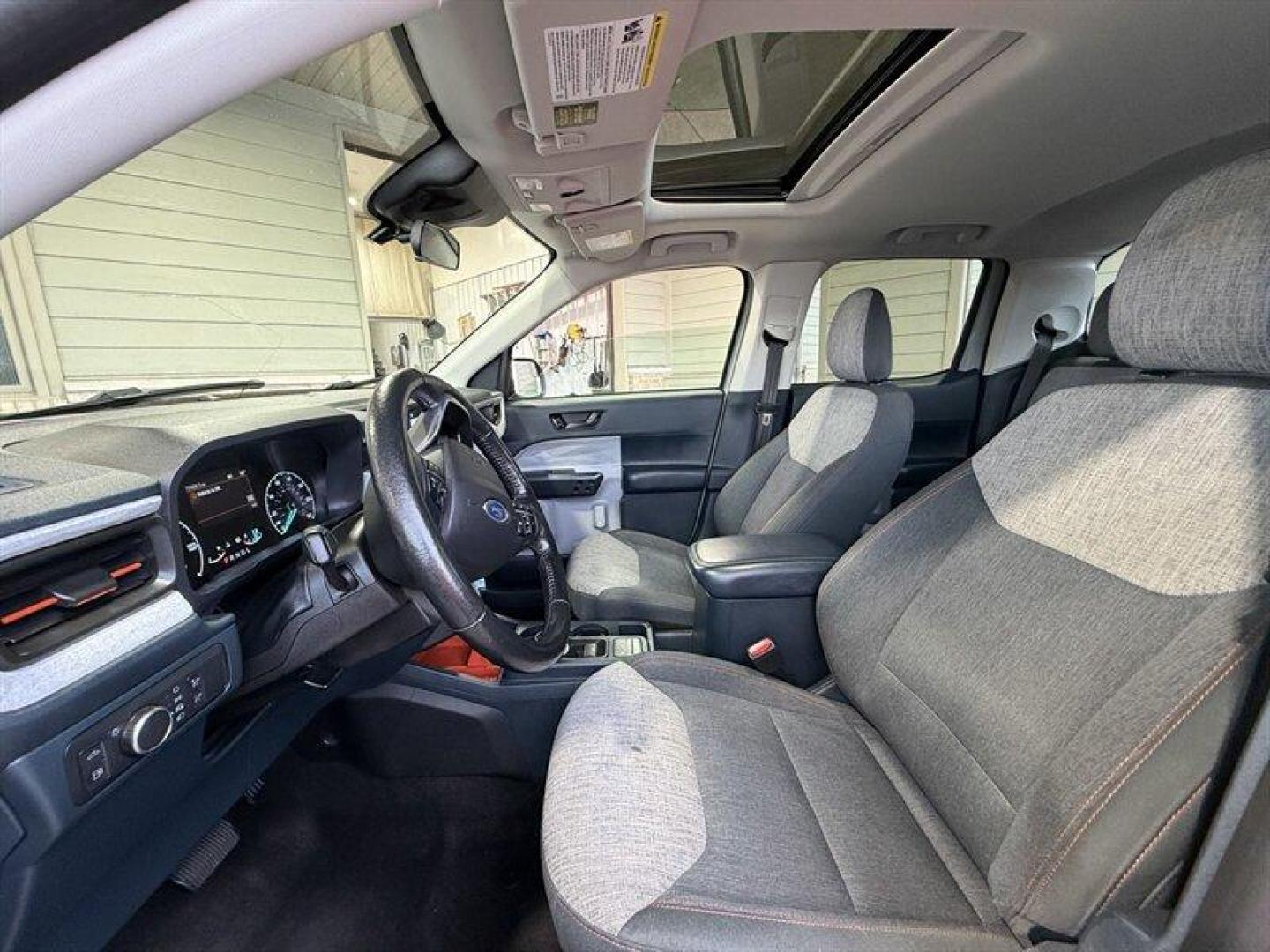 2022 Green Ford Maverick XLT (3FTTW8E3XNR) with an 2.5L Hybrid I4 191hp engine, Automatic transmission, located at 25355 Eames Street, Channahon, IL, 60410, (815) 467-1807, 41.429108, -88.228432 - This is not a commuter its a compact truck that thinks bigger. The 2022 Ford Maverick XLT with the 2.5L Hybrid I-4 and electric assist puts a hard stop on compromise: 191 combined horsepower, blistering efficiency (42 MPG city / 33 MPG highway), and the kind of real-world utility your weeknight her - Photo#11