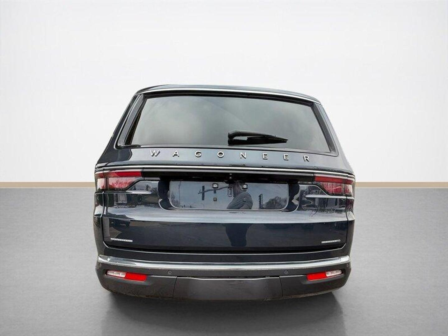 2022 Baltic Gray Metallic Clear Coat Jeep Wagoneer Series I (1C4SJVAT9NS) with an HEMI eTorque 5.7L Mild Hybrid V8 392hp 404ft. lbs. engine, Automatic transmission, located at 25355 Eames Street, Channahon, IL, 60410, (815) 467-1807, 41.429108, -88.228432 - Behold a modern American icon reborn: the 2022 Jeep Wagoneer Series I, cloaked in the sublime River Rock exterior and appointed in refined Global Black leather. Powered by the commanding HEMI eTorque 5.7L Mild Hybrid V8 delivering a muscular 392 horsepower and 404 lb-ft of torque this flagship-cal - Photo#4