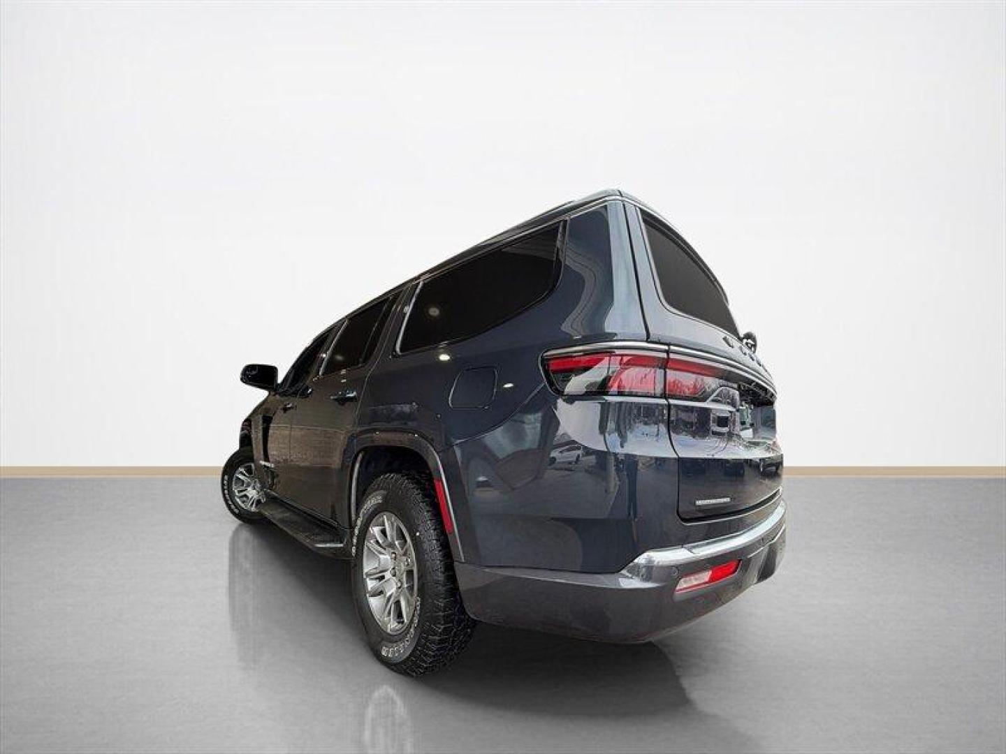 2022 Baltic Gray Metallic Clear Coat Jeep Wagoneer Series I (1C4SJVAT9NS) with an HEMI eTorque 5.7L Mild Hybrid V8 392hp 404ft. lbs. engine, Automatic transmission, located at 25355 Eames Street, Channahon, IL, 60410, (815) 467-1807, 41.429108, -88.228432 - Behold a modern American icon reborn: the 2022 Jeep Wagoneer Series I, cloaked in the sublime River Rock exterior and appointed in refined Global Black leather. Powered by the commanding HEMI eTorque 5.7L Mild Hybrid V8 delivering a muscular 392 horsepower and 404 lb-ft of torque this flagship-cal - Photo#5