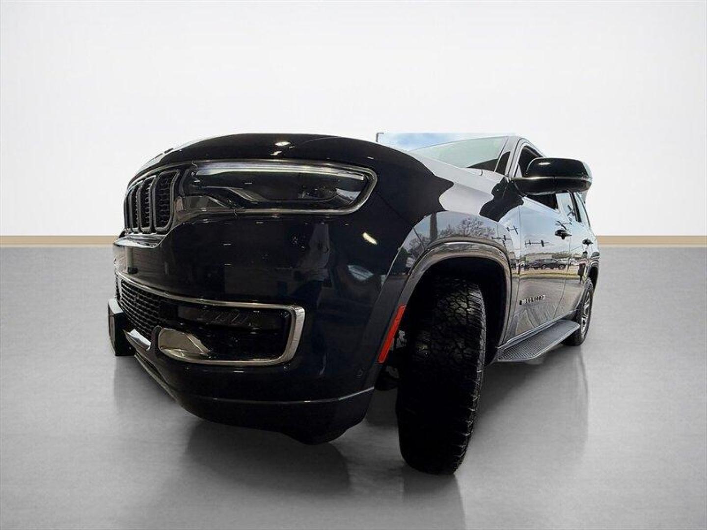 2022 Baltic Gray Metallic Clear Coat Jeep Wagoneer Series I (1C4SJVAT9NS) with an HEMI eTorque 5.7L Mild Hybrid V8 392hp 404ft. lbs. engine, Automatic transmission, located at 25355 Eames Street, Channahon, IL, 60410, (815) 467-1807, 41.429108, -88.228432 - Behold a modern American icon reborn: the 2022 Jeep Wagoneer Series I, cloaked in the sublime River Rock exterior and appointed in refined Global Black leather. Powered by the commanding HEMI eTorque 5.7L Mild Hybrid V8 delivering a muscular 392 horsepower and 404 lb-ft of torque this flagship-cal - Photo#7