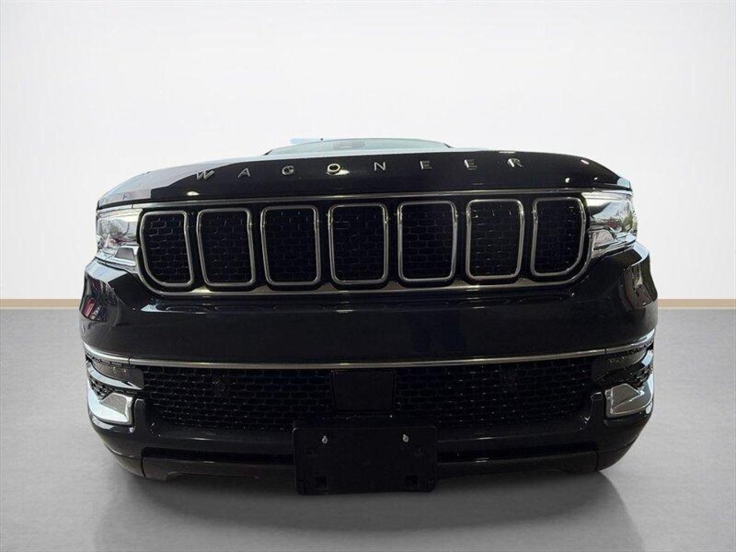 2022 Baltic Gray Metallic Clear Coat Jeep Wagoneer Series I (1C4SJVAT9NS) with an HEMI eTorque 5.7L Mild Hybrid V8 392hp 404ft. lbs. engine, Automatic transmission, located at 25355 Eames Street, Channahon, IL, 60410, (815) 467-1807, 41.429108, -88.228432 - Behold a modern American icon reborn: the 2022 Jeep Wagoneer Series I, cloaked in the sublime River Rock exterior and appointed in refined Global Black leather. Powered by the commanding HEMI eTorque 5.7L Mild Hybrid V8 delivering a muscular 392 horsepower and 404 lb-ft of torque this flagship-cal - Photo#8
