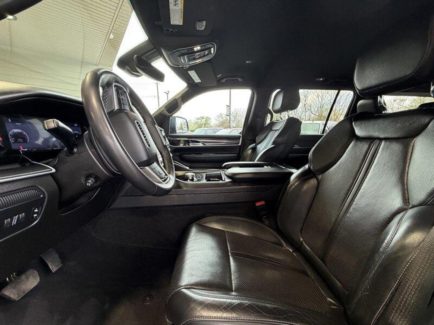 2022 Baltic Gray Metallic Clear Coat Jeep Wagoneer Series I (1C4SJVAT9NS) with an HEMI eTorque 5.7L Mild Hybrid V8 392hp 404ft. lbs. engine, Automatic transmission, located at 25355 Eames Street, Channahon, IL, 60410, (815) 467-1807, 41.429108, -88.228432 - Behold a modern American icon reborn: the 2022 Jeep Wagoneer Series I, cloaked in the sublime River Rock exterior and appointed in refined Global Black leather. Powered by the commanding HEMI eTorque 5.7L Mild Hybrid V8 delivering a muscular 392 horsepower and 404 lb-ft of torque this flagship-cal - Photo#11