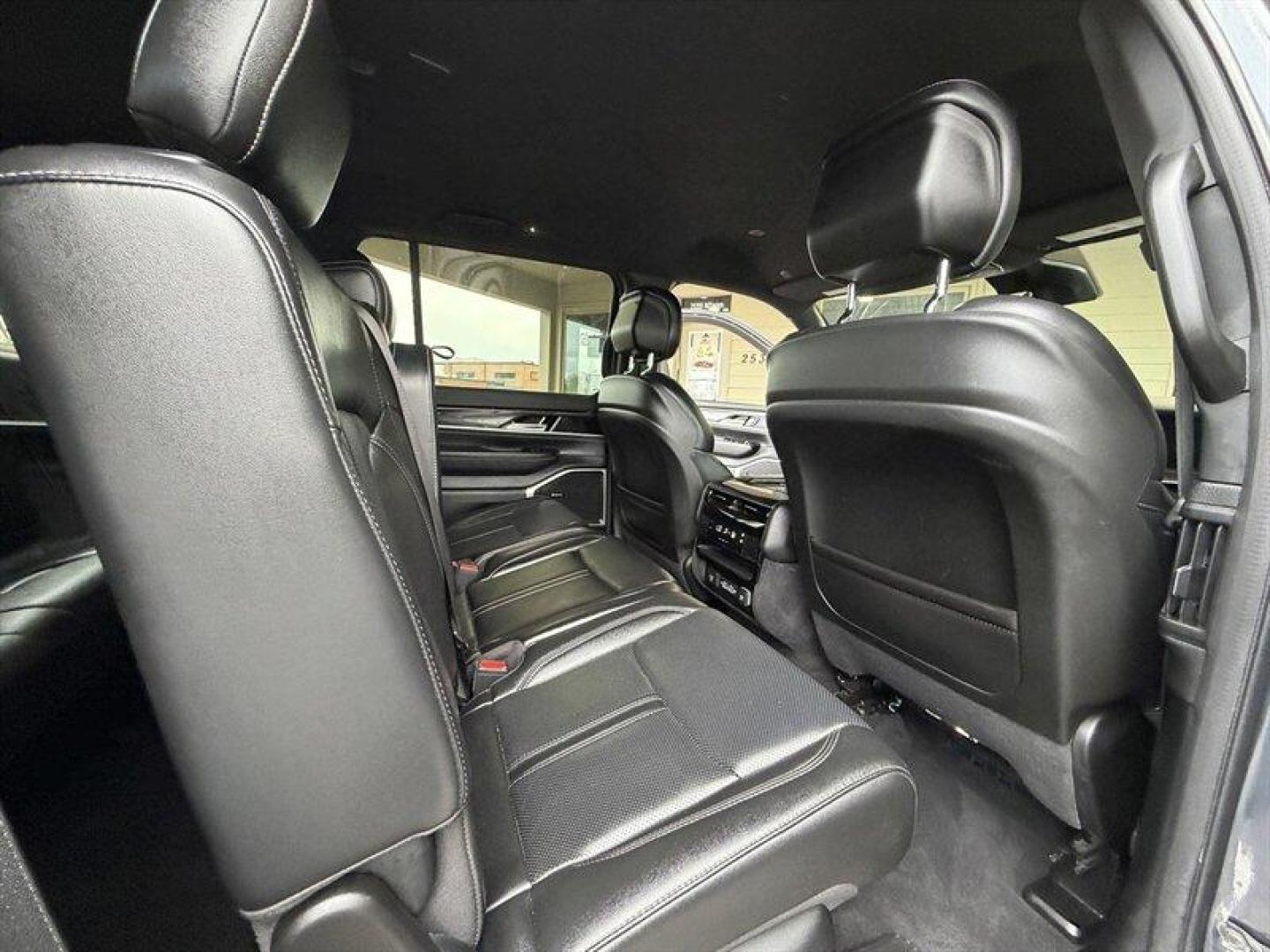 2022 Baltic Gray Metallic Clear Coat Jeep Wagoneer Series I (1C4SJVAT9NS) with an HEMI eTorque 5.7L Mild Hybrid V8 392hp 404ft. lbs. engine, Automatic transmission, located at 25355 Eames Street, Channahon, IL, 60410, (815) 467-1807, 41.429108, -88.228432 - Behold a modern American icon reborn: the 2022 Jeep Wagoneer Series I, cloaked in the sublime River Rock exterior and appointed in refined Global Black leather. Powered by the commanding HEMI eTorque 5.7L Mild Hybrid V8 delivering a muscular 392 horsepower and 404 lb-ft of torque this flagship-cal - Photo#14