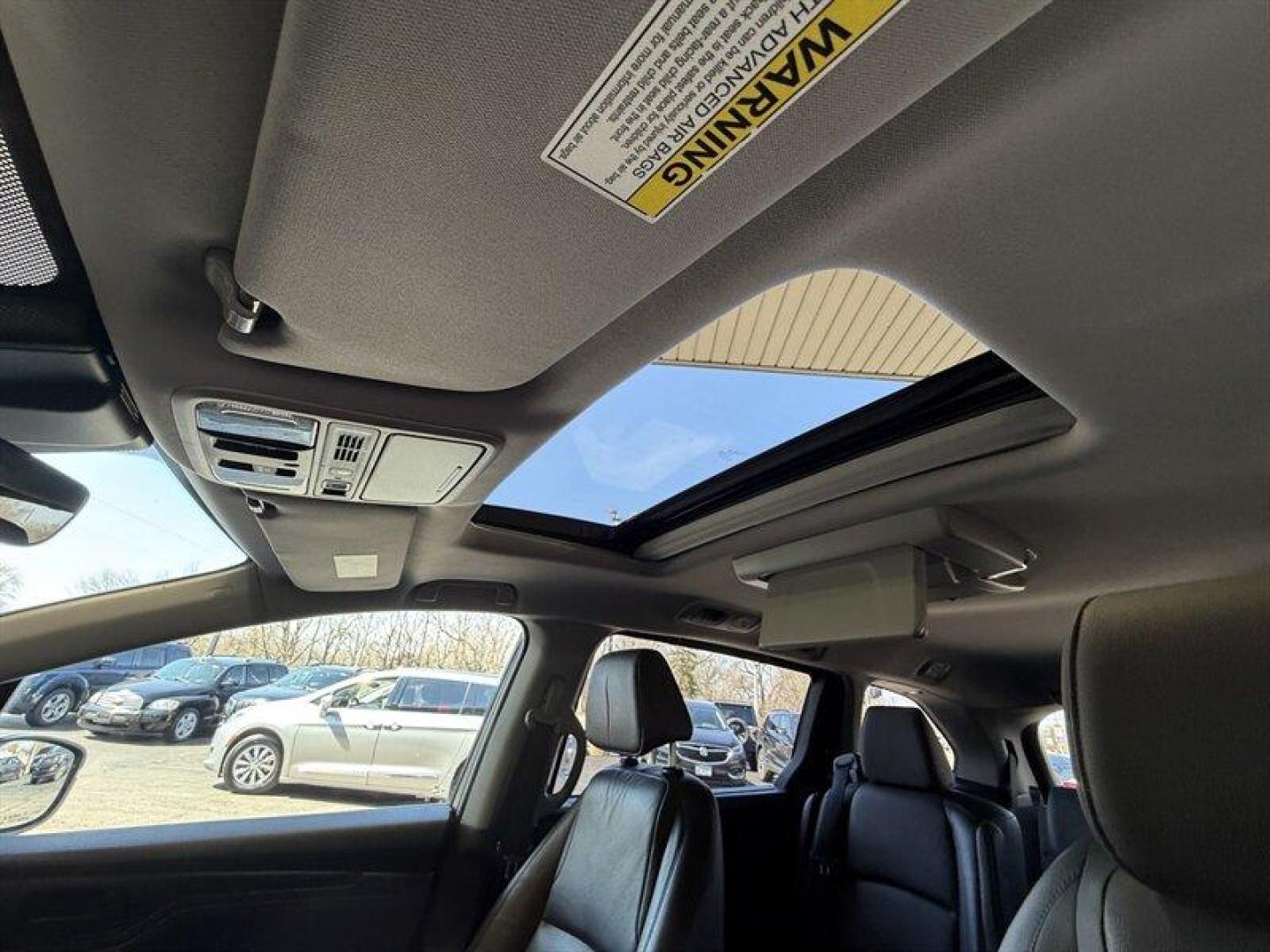 2018 Modern Steel Metallic Honda Odyssey Touring (5FNRL6H8XJB) with an 3.5L V6 280hp 262ft. lbs. engine, Automatic transmission, located at 25355 Eames Street, Channahon, IL, 60410, (815) 467-1807, 41.429108, -88.228432 - Meet the 2018 Honda Odyssey Touring a thoughtfully equipped, family-ready minivan that blends a powerful V6 with comfortable, tech-forward interiors and smart safety features. Finished in Pacific Pewter Metallic with a gray interior, this Odyssey has good mileage (below 81,000 miles, averaging unde - Photo#29