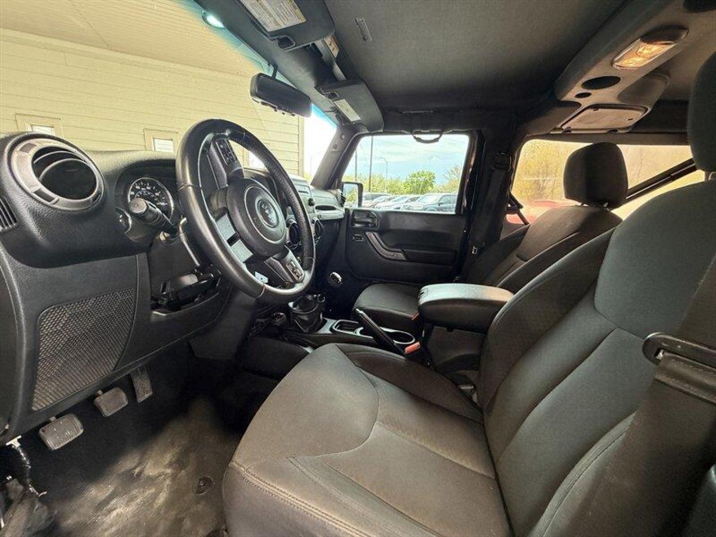 2017 Black Clear Coat Jeep Wrangler Sport (1C4AJWAG6HL) with an 3.6L V6 285hp 260ft. lbs. engine, 6 Speed Manual transmission, located at 25355 Eames Street, Channahon, IL, 60410, (815) 467-1807, 41.429108, -88.228432 - Meet the 2017 Jeep Wrangler Sport the stubborn, sunshine-loving off-roader that refuses to blend in. Under the hood sits the 3.6L V6 Pentastar pumping out a deliciously eager 285 hp and 260 lb-ft of torque, so yes it will hustle when you tell it to. EPA-rated at 17 MPG city and 21 MPG highway, its - Photo#11