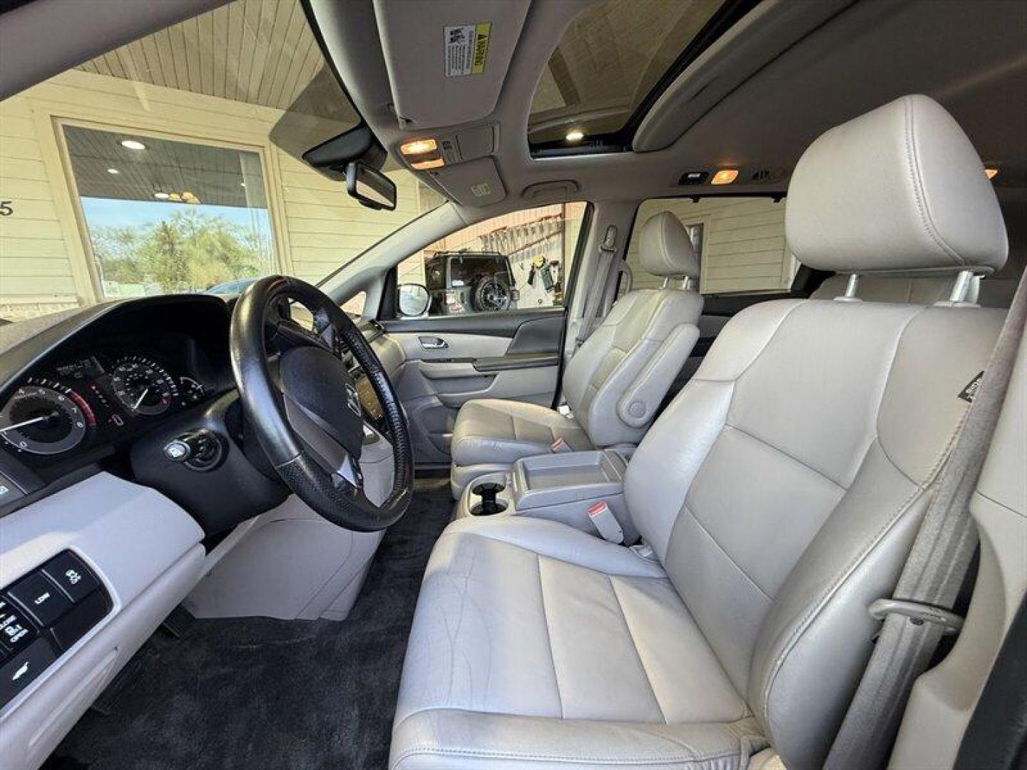 2016 Crystal Black Pearl Honda Odyssey EX-L (5FNRL5H60GB) with an 3.5 engine, Automatic transmission, located at 25355 Eames Street, Channahon, IL, 60410, (815) 467-1807, 41.429108, -88.228432 - Dont hesitate this 2016 Honda Odyssey EX-L is exactly the no-nonsense, family-hauling machine you want. Finished in Crystal Black Pearl with a clean Gray leather interior, its got the presence of a premium minivan and the practicality to back it up. Under the hood sits the proven 3.5L V6 that deliv - Photo#11