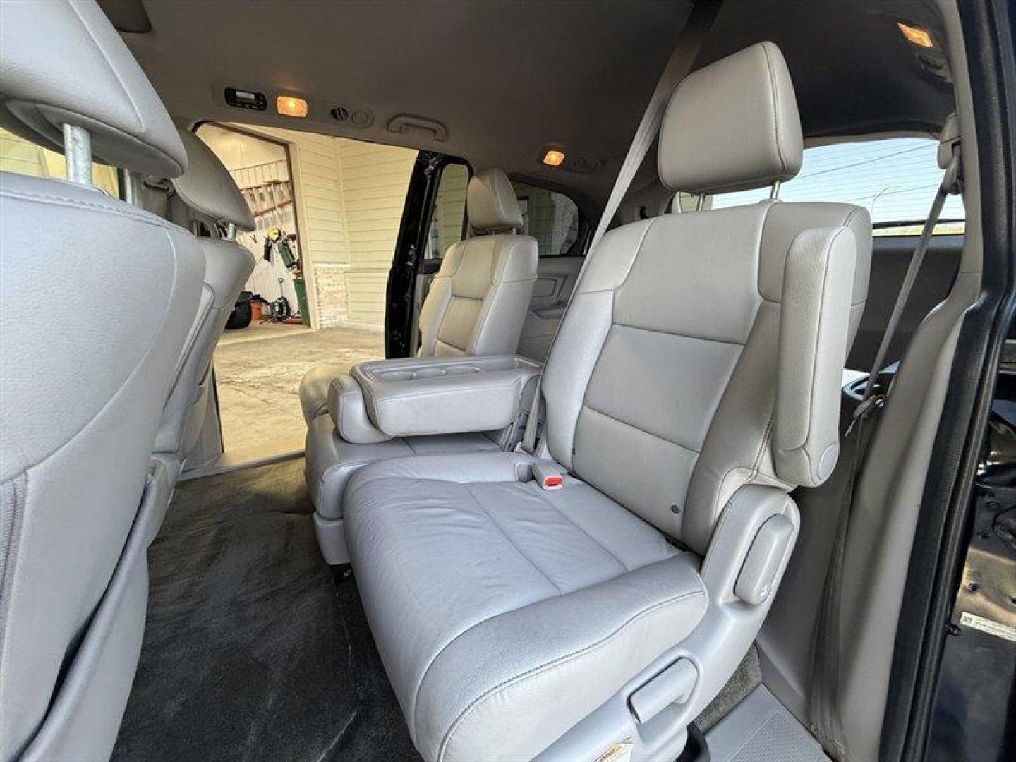 2016 Crystal Black Pearl Honda Odyssey EX-L (5FNRL5H60GB) with an 3.5 engine, Automatic transmission, located at 25355 Eames Street, Channahon, IL, 60410, (815) 467-1807, 41.429108, -88.228432 - Dont hesitate this 2016 Honda Odyssey EX-L is exactly the no-nonsense, family-hauling machine you want. Finished in Crystal Black Pearl with a clean Gray leather interior, its got the presence of a premium minivan and the practicality to back it up. Under the hood sits the proven 3.5L V6 that deliv - Photo#12