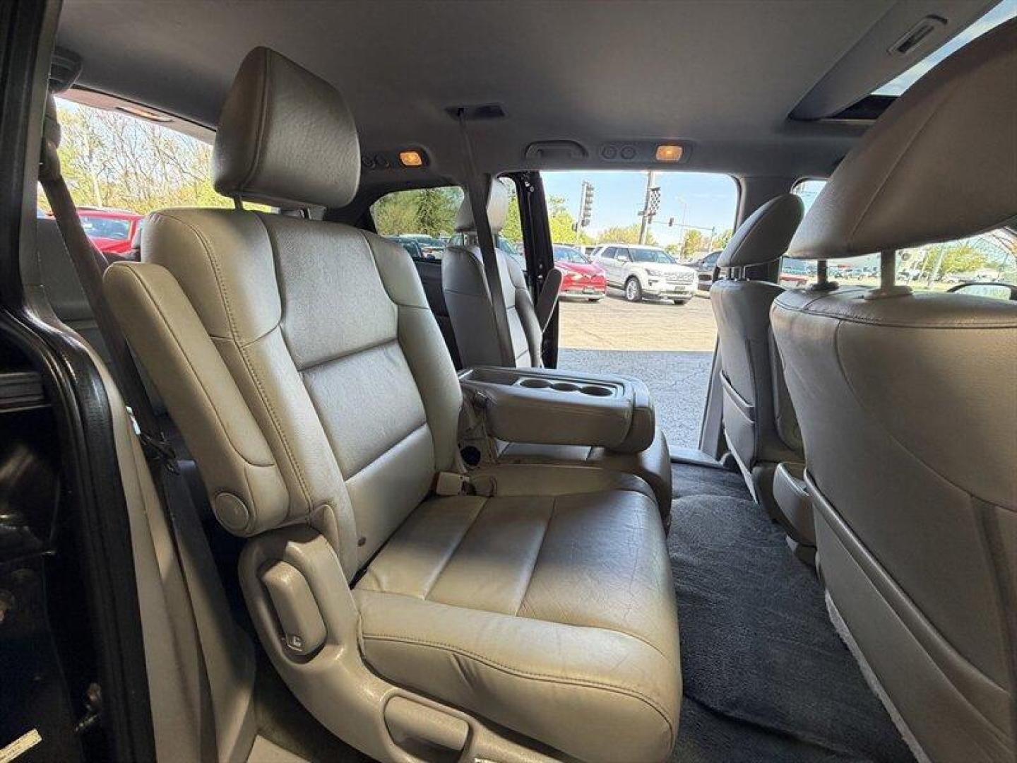 2016 Crystal Black Pearl Honda Odyssey EX-L (5FNRL5H60GB) with an 3.5 engine, Automatic transmission, located at 25355 Eames Street, Channahon, IL, 60410, (815) 467-1807, 41.429108, -88.228432 - Dont hesitate this 2016 Honda Odyssey EX-L is exactly the no-nonsense, family-hauling machine you want. Finished in Crystal Black Pearl with a clean Gray leather interior, its got the presence of a premium minivan and the practicality to back it up. Under the hood sits the proven 3.5L V6 that deliv - Photo#15