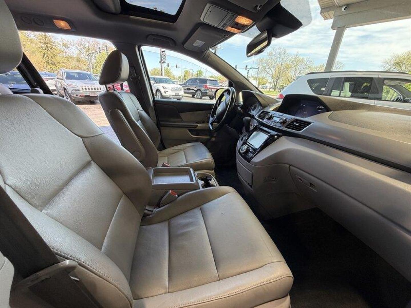 2016 Crystal Black Pearl Honda Odyssey EX-L (5FNRL5H60GB) with an 3.5 engine, Automatic transmission, located at 25355 Eames Street, Channahon, IL, 60410, (815) 467-1807, 41.429108, -88.228432 - Dont hesitate this 2016 Honda Odyssey EX-L is exactly the no-nonsense, family-hauling machine you want. Finished in Crystal Black Pearl with a clean Gray leather interior, its got the presence of a premium minivan and the practicality to back it up. Under the hood sits the proven 3.5L V6 that deliv - Photo#17