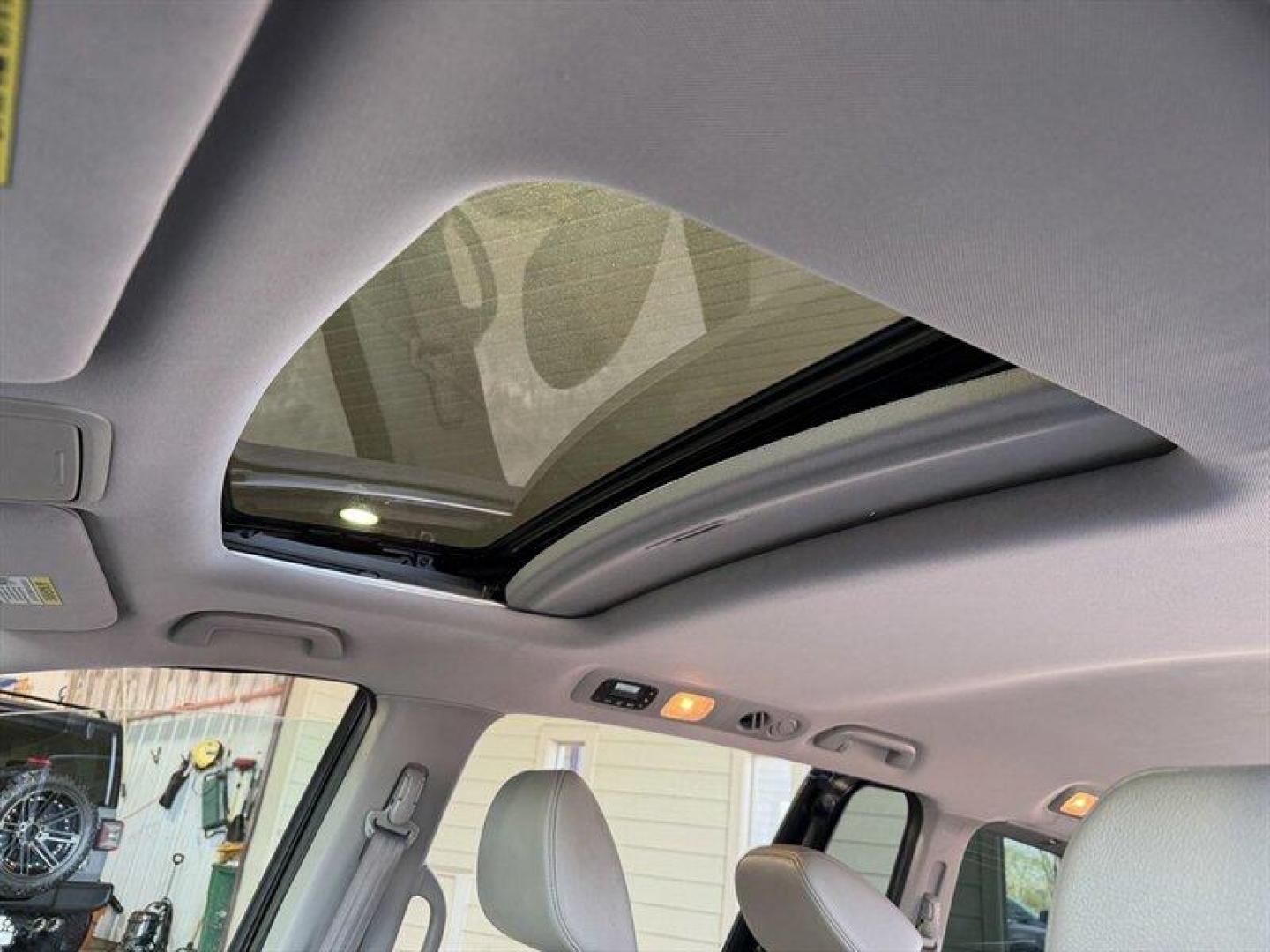 2016 Crystal Black Pearl Honda Odyssey EX-L (5FNRL5H60GB) with an 3.5 engine, Automatic transmission, located at 25355 Eames Street, Channahon, IL, 60410, (815) 467-1807, 41.429108, -88.228432 - Dont hesitate this 2016 Honda Odyssey EX-L is exactly the no-nonsense, family-hauling machine you want. Finished in Crystal Black Pearl with a clean Gray leather interior, its got the presence of a premium minivan and the practicality to back it up. Under the hood sits the proven 3.5L V6 that deliv - Photo#20