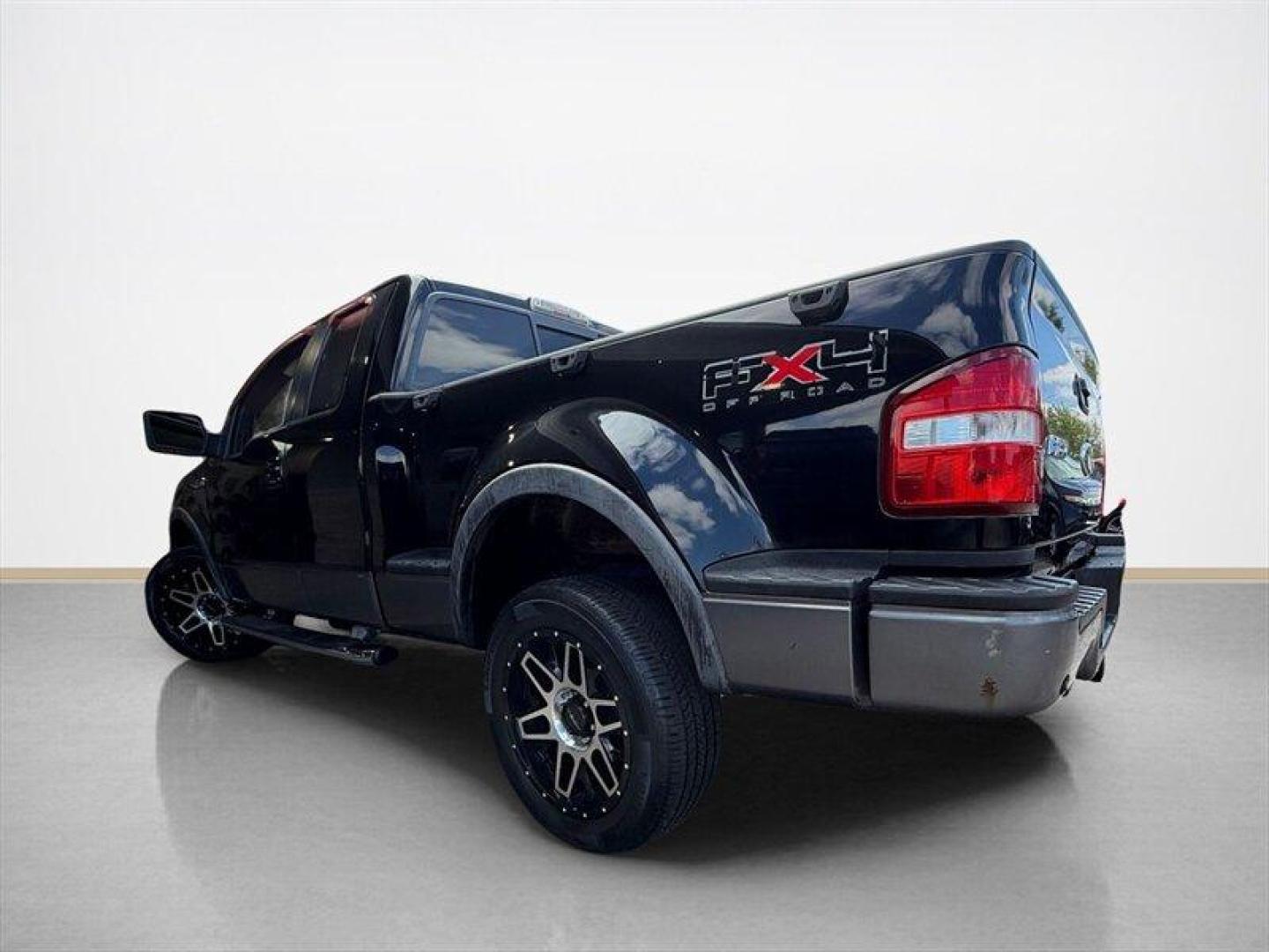 2009 Black Clearcoat Ford F-150 XLT (1FTPX04V99K) with an Triton 5.4L Flex Fuel V8 320hp 390ft. lbs. engine, Automatic transmission, located at 25355 Eames Street, Channahon, IL, 60410, (815) 467-1807, 41.429108, -88.228432 - 2009 Ford F-150 X-Cab FX4 4x4 built in the era when trucks were trucks and nobody needed a touchscreen to feel tough. Local trade with heated leather for your backside and a sunroof for your cowboy daydreams. Its got rust, its got character, and its got that I still show up for work attitude. Runs - Photo#5