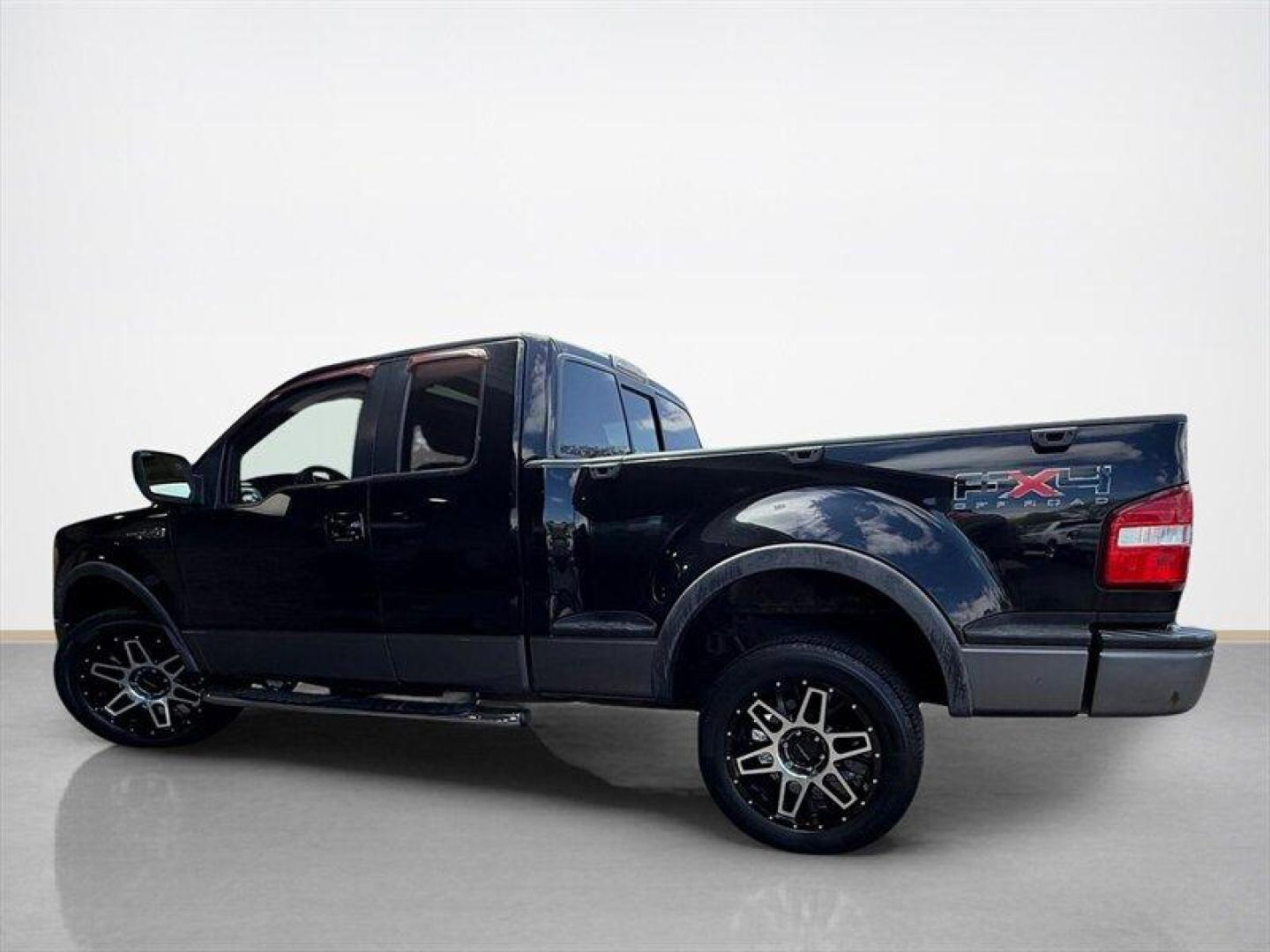 2009 Black Clearcoat Ford F-150 XLT (1FTPX04V99K) with an Triton 5.4L Flex Fuel V8 320hp 390ft. lbs. engine, Automatic transmission, located at 25355 Eames Street, Channahon, IL, 60410, (815) 467-1807, 41.429108, -88.228432 - 2009 Ford F-150 X-Cab FX4 4x4 built in the era when trucks were trucks and nobody needed a touchscreen to feel tough. Local trade with heated leather for your backside and a sunroof for your cowboy daydreams. Its got rust, its got character, and its got that I still show up for work attitude. Runs - Photo#6