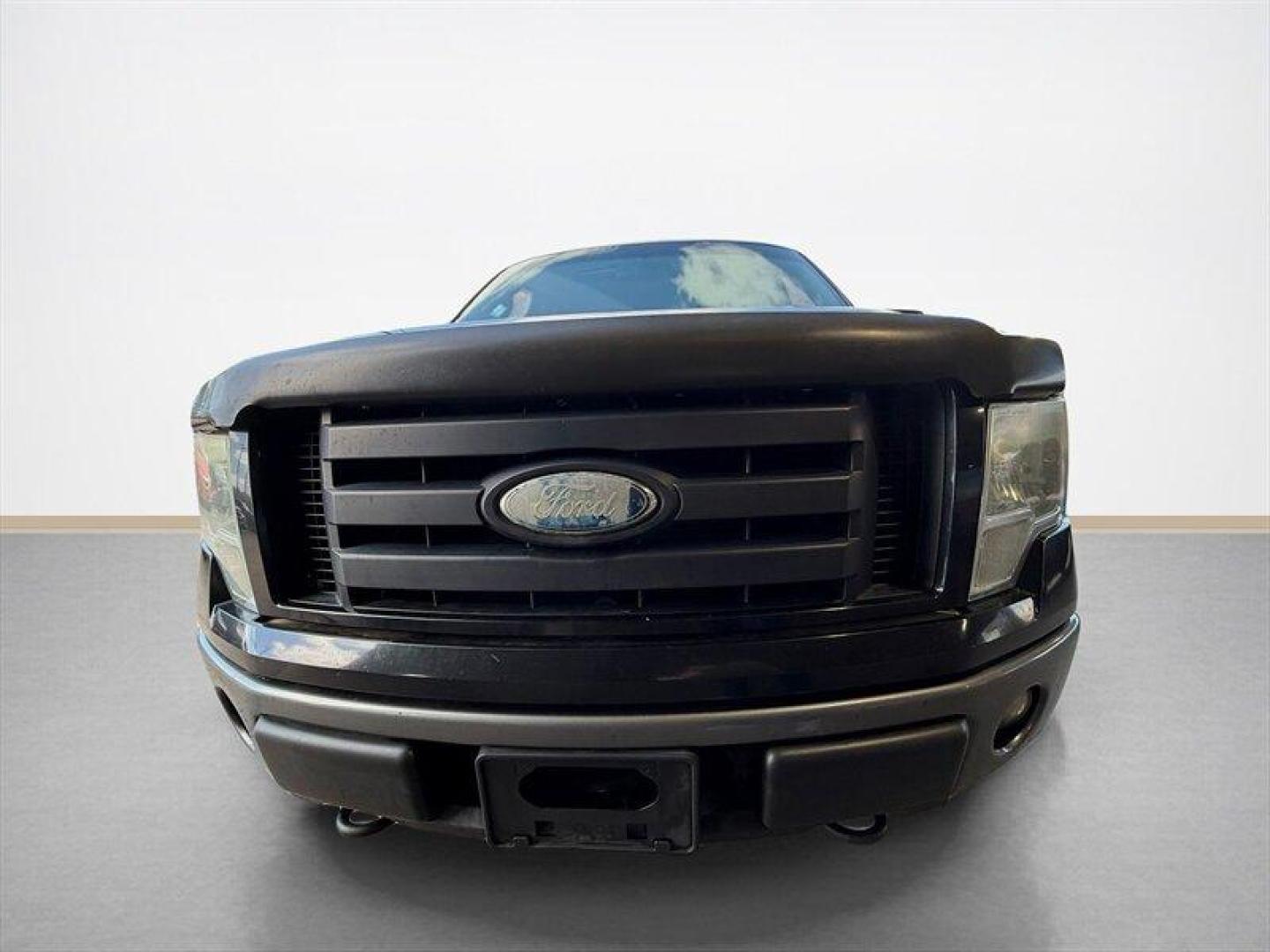 2009 Black Clearcoat Ford F-150 XLT (1FTPX04V99K) with an Triton 5.4L Flex Fuel V8 320hp 390ft. lbs. engine, Automatic transmission, located at 25355 Eames Street, Channahon, IL, 60410, (815) 467-1807, 41.429108, -88.228432 - 2009 Ford F-150 X-Cab FX4 4x4 built in the era when trucks were trucks and nobody needed a touchscreen to feel tough. Local trade with heated leather for your backside and a sunroof for your cowboy daydreams. Its got rust, its got character, and its got that I still show up for work attitude. Runs - Photo#8