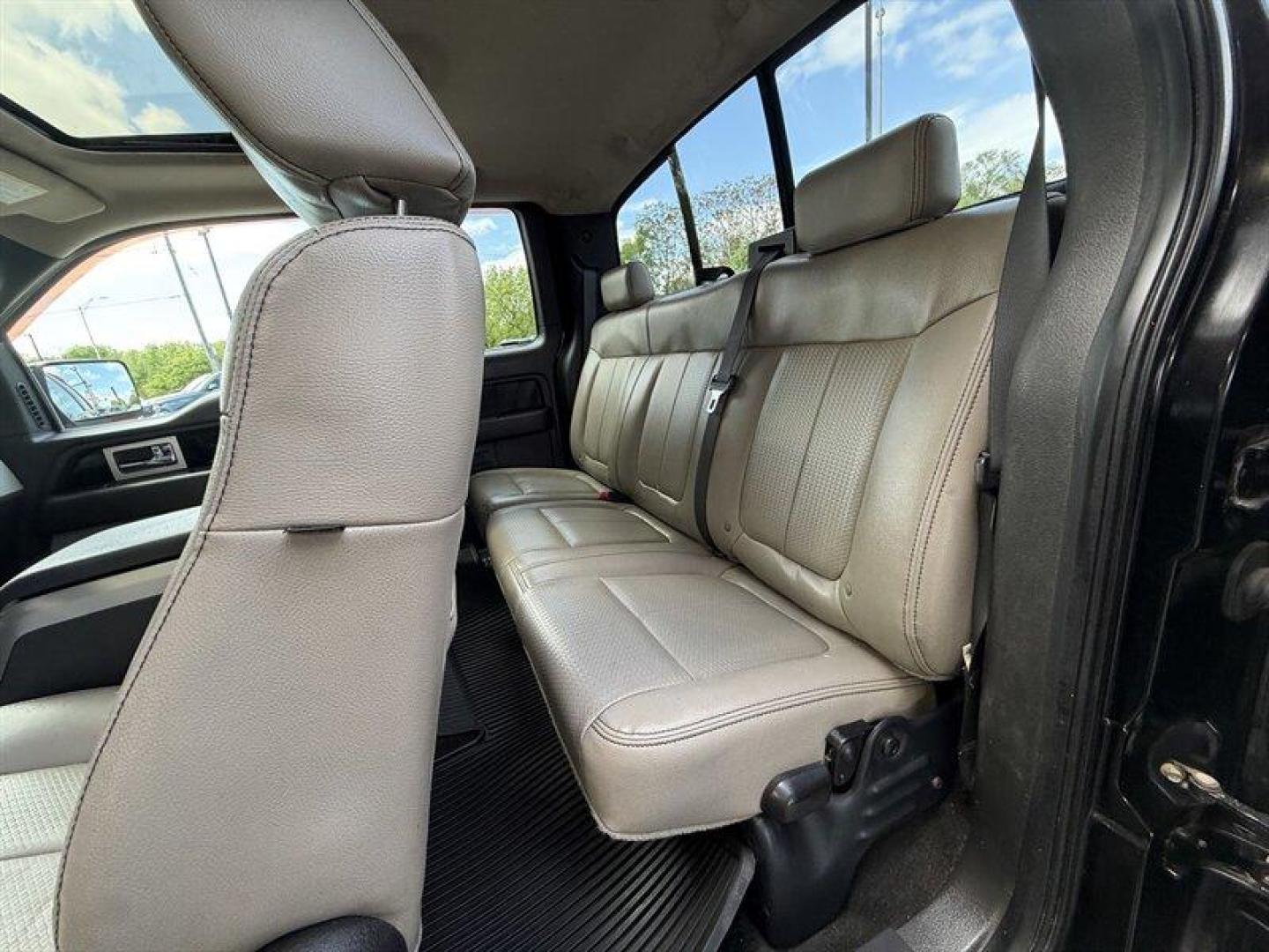 2009 Black Clearcoat Ford F-150 XLT (1FTPX04V99K) with an Triton 5.4L Flex Fuel V8 320hp 390ft. lbs. engine, Automatic transmission, located at 25355 Eames Street, Channahon, IL, 60410, (815) 467-1807, 41.429108, -88.228432 - 2009 Ford F-150 X-Cab FX4 4x4 built in the era when trucks were trucks and nobody needed a touchscreen to feel tough. Local trade with heated leather for your backside and a sunroof for your cowboy daydreams. Its got rust, its got character, and its got that I still show up for work attitude. Runs - Photo#12