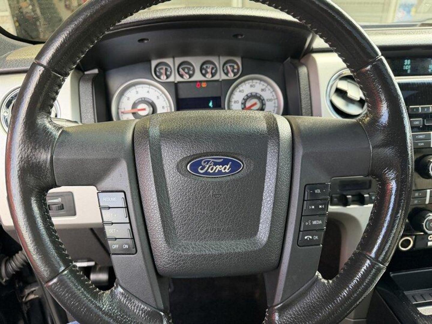 2009 Black Clearcoat Ford F-150 XLT (1FTPX04V99K) with an Triton 5.4L Flex Fuel V8 320hp 390ft. lbs. engine, Automatic transmission, located at 25355 Eames Street, Channahon, IL, 60410, (815) 467-1807, 41.429108, -88.228432 - 2009 Ford F-150 X-Cab FX4 4x4 built in the era when trucks were trucks and nobody needed a touchscreen to feel tough. Local trade with heated leather for your backside and a sunroof for your cowboy daydreams. Its got rust, its got character, and its got that I still show up for work attitude. Runs - Photo#26