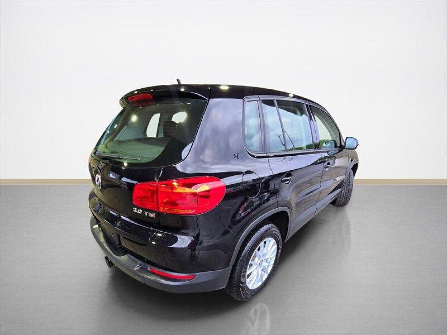 2014 Deep Black Metallic Volkswagen Tiguan S (WVGCV3AXXEW) with an 2.0L Turbo I4 200hp 207ft. lbs. engine, 6 Speed Manual transmission, located at 25355 Eames Street, Channahon, IL, 60410, (815) 467-1807, 41.429108, -88.228432 - ** HARD TO FIND 6-SPEED MANUAL ** 2014 Volkswagen Tiguan S Deep Black Metallic exterior with Black cloth interior. Powered by a 2.0L turbocharged inline-4 producing 200 hp and 207 lb-ft of torque, this Tiguan delivers confident acceleration and everyday driving flexibility. It has under 92,000 mile - Photo#3