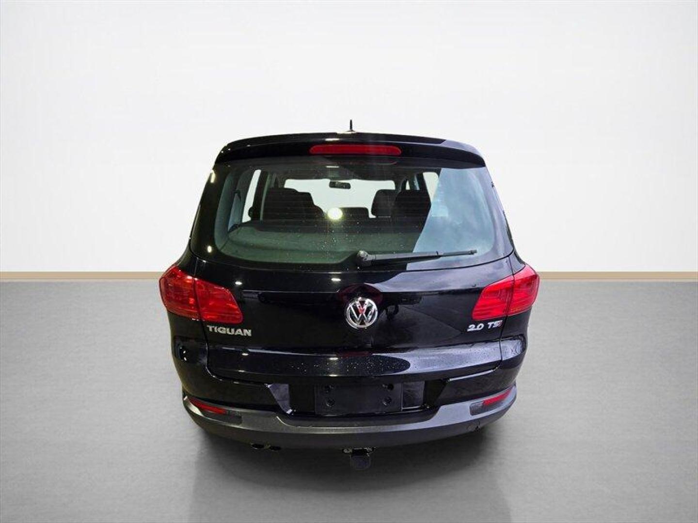 2014 Deep Black Metallic Volkswagen Tiguan S (WVGCV3AXXEW) with an 2.0L Turbo I4 200hp 207ft. lbs. engine, 6 Speed Manual transmission, located at 25355 Eames Street, Channahon, IL, 60410, (815) 467-1807, 41.429108, -88.228432 - ** HARD TO FIND 6-SPEED MANUAL ** 2014 Volkswagen Tiguan S Deep Black Metallic exterior with Black cloth interior. Powered by a 2.0L turbocharged inline-4 producing 200 hp and 207 lb-ft of torque, this Tiguan delivers confident acceleration and everyday driving flexibility. It has under 92,000 mile - Photo#4