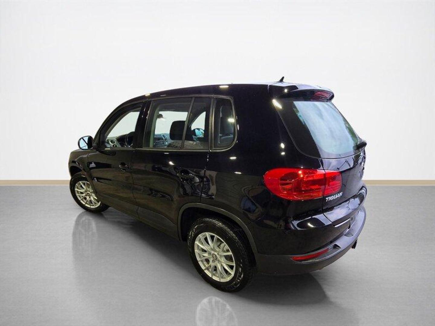 2014 Deep Black Metallic Volkswagen Tiguan S (WVGCV3AXXEW) with an 2.0L Turbo I4 200hp 207ft. lbs. engine, 6 Speed Manual transmission, located at 25355 Eames Street, Channahon, IL, 60410, (815) 467-1807, 41.429108, -88.228432 - ** HARD TO FIND 6-SPEED MANUAL ** 2014 Volkswagen Tiguan S Deep Black Metallic exterior with Black cloth interior. Powered by a 2.0L turbocharged inline-4 producing 200 hp and 207 lb-ft of torque, this Tiguan delivers confident acceleration and everyday driving flexibility. It has under 92,000 mile - Photo#5