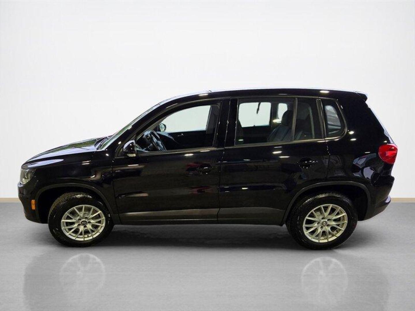 2014 Deep Black Metallic Volkswagen Tiguan S (WVGCV3AXXEW) with an 2.0L Turbo I4 200hp 207ft. lbs. engine, 6 Speed Manual transmission, located at 25355 Eames Street, Channahon, IL, 60410, (815) 467-1807, 41.429108, -88.228432 - ** HARD TO FIND 6-SPEED MANUAL ** 2014 Volkswagen Tiguan S Deep Black Metallic exterior with Black cloth interior. Powered by a 2.0L turbocharged inline-4 producing 200 hp and 207 lb-ft of torque, this Tiguan delivers confident acceleration and everyday driving flexibility. It has under 92,000 mile - Photo#6