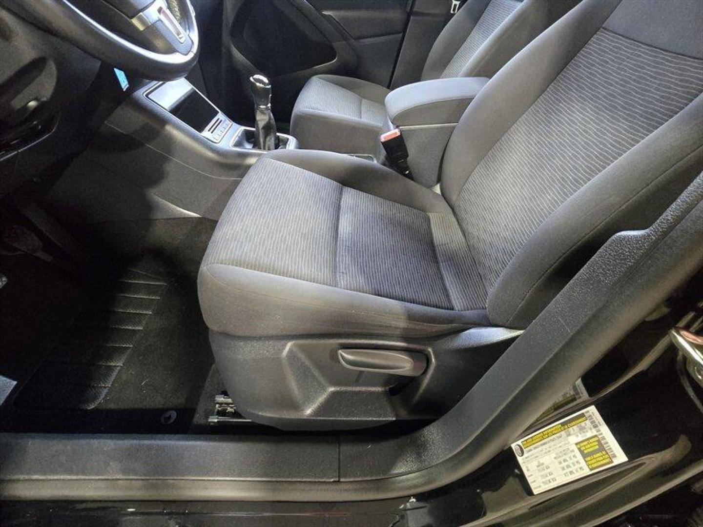 2014 Deep Black Metallic Volkswagen Tiguan S (WVGCV3AXXEW) with an 2.0L Turbo I4 200hp 207ft. lbs. engine, 6 Speed Manual transmission, located at 25355 Eames Street, Channahon, IL, 60410, (815) 467-1807, 41.429108, -88.228432 - ** HARD TO FIND 6-SPEED MANUAL ** 2014 Volkswagen Tiguan S Deep Black Metallic exterior with Black cloth interior. Powered by a 2.0L turbocharged inline-4 producing 200 hp and 207 lb-ft of torque, this Tiguan delivers confident acceleration and everyday driving flexibility. It has under 92,000 mile - Photo#9