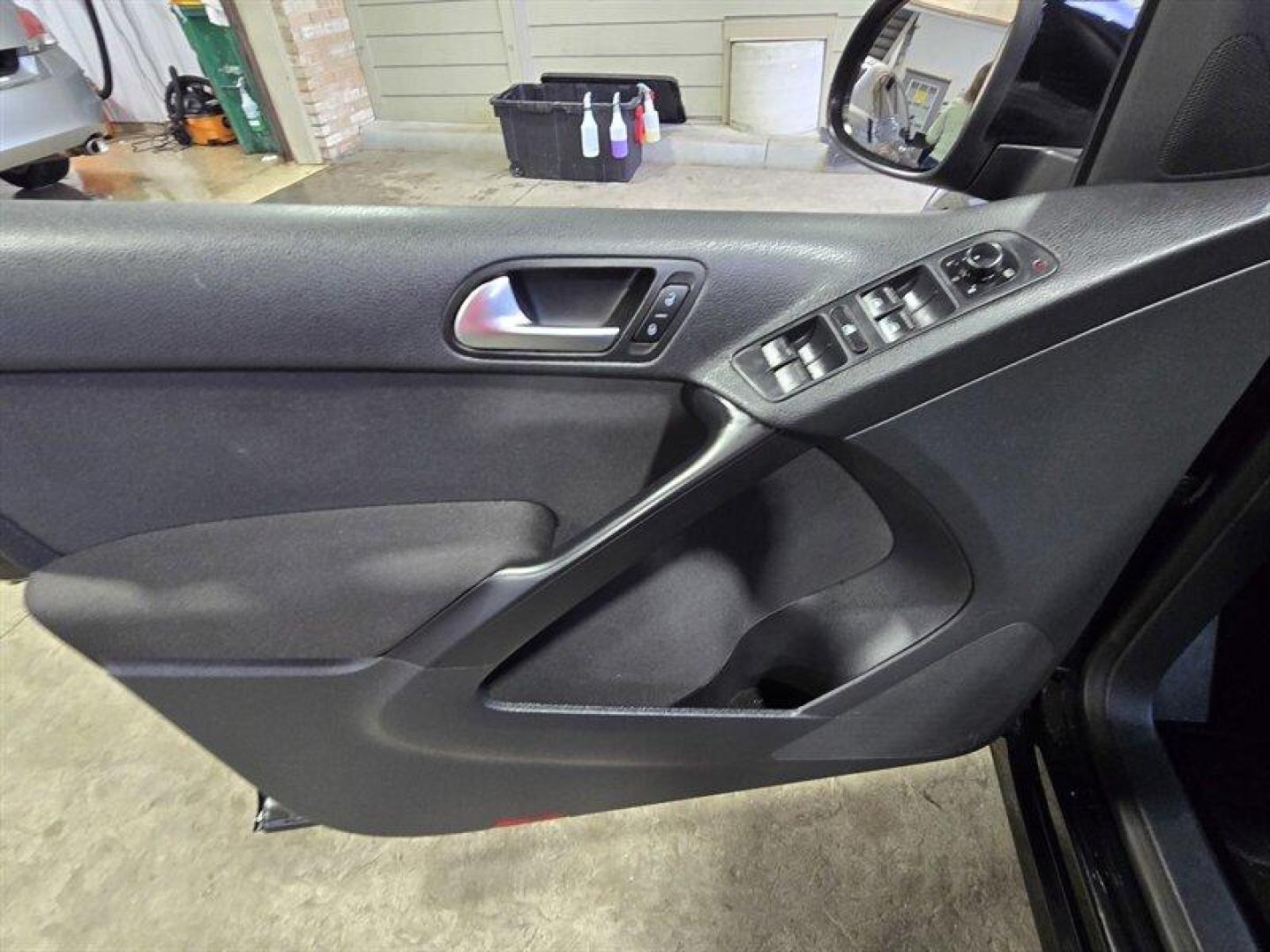 2014 Deep Black Metallic Volkswagen Tiguan S (WVGCV3AXXEW) with an 2.0L Turbo I4 200hp 207ft. lbs. engine, 6 Speed Manual transmission, located at 25355 Eames Street, Channahon, IL, 60410, (815) 467-1807, 41.429108, -88.228432 - ** HARD TO FIND 6-SPEED MANUAL ** 2014 Volkswagen Tiguan S Deep Black Metallic exterior with Black cloth interior. Powered by a 2.0L turbocharged inline-4 producing 200 hp and 207 lb-ft of torque, this Tiguan delivers confident acceleration and everyday driving flexibility. It has under 92,000 mile - Photo#10