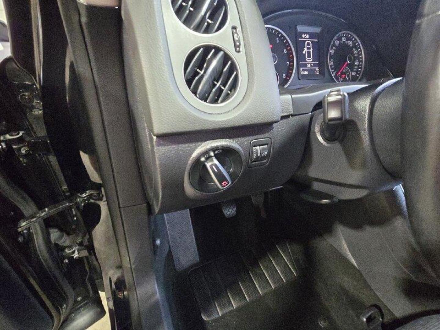 2014 Deep Black Metallic Volkswagen Tiguan S (WVGCV3AXXEW) with an 2.0L Turbo I4 200hp 207ft. lbs. engine, 6 Speed Manual transmission, located at 25355 Eames Street, Channahon, IL, 60410, (815) 467-1807, 41.429108, -88.228432 - ** HARD TO FIND 6-SPEED MANUAL ** 2014 Volkswagen Tiguan S Deep Black Metallic exterior with Black cloth interior. Powered by a 2.0L turbocharged inline-4 producing 200 hp and 207 lb-ft of torque, this Tiguan delivers confident acceleration and everyday driving flexibility. It has under 92,000 mile - Photo#11
