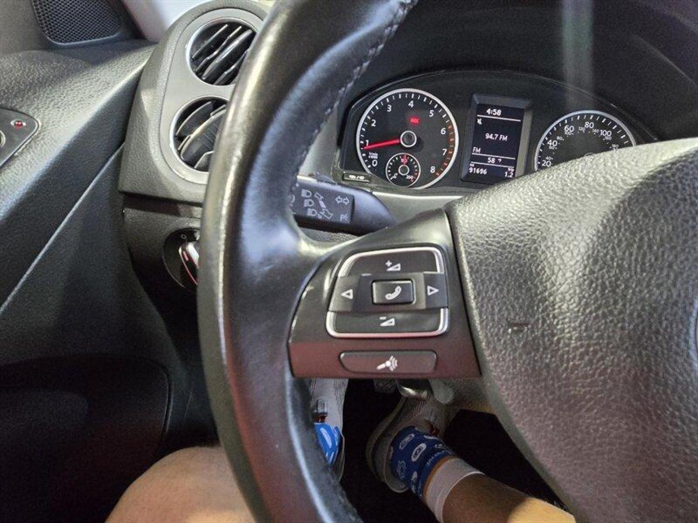 2014 Deep Black Metallic Volkswagen Tiguan S (WVGCV3AXXEW) with an 2.0L Turbo I4 200hp 207ft. lbs. engine, 6 Speed Manual transmission, located at 25355 Eames Street, Channahon, IL, 60410, (815) 467-1807, 41.429108, -88.228432 - ** HARD TO FIND 6-SPEED MANUAL ** 2014 Volkswagen Tiguan S Deep Black Metallic exterior with Black cloth interior. Powered by a 2.0L turbocharged inline-4 producing 200 hp and 207 lb-ft of torque, this Tiguan delivers confident acceleration and everyday driving flexibility. It has under 92,000 mile - Photo#12