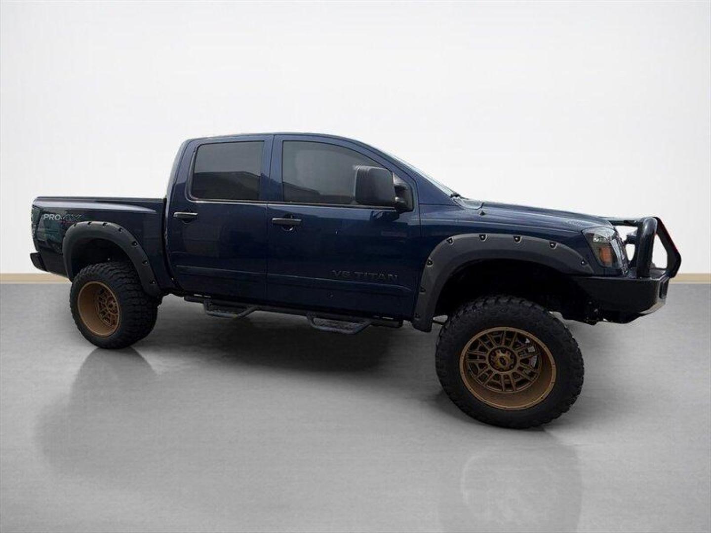 2010 Navy Blue Nissan Titan PRO-4X (1N6BA0EC7AN) with an 5.6L Flex Fuel V8 317hp 385ft. lbs. engine, Automatic transmission, located at 25355 Eames Street, Channahon, IL, 60410, (815) 467-1807, 41.429108, -88.228432 - Meet your next project with personality this 2010 Nissan Titan PRO-4X. And lets just get one thing straight right out the gate she is NOT a delicate little garage-kept princess. Shes more like that wild friend whos got stories, a little attitude, and absolutely zero apologies. This is a Texas truc - Photo#1