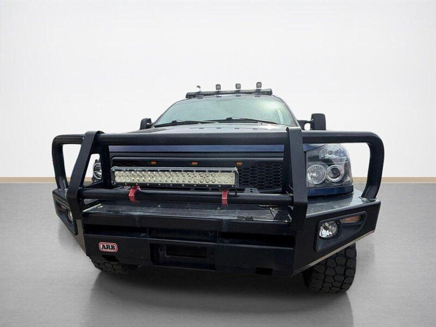 2010 Navy Blue Nissan Titan PRO-4X (1N6BA0EC7AN) with an 5.6L Flex Fuel V8 317hp 385ft. lbs. engine, Automatic transmission, located at 25355 Eames Street, Channahon, IL, 60410, (815) 467-1807, 41.429108, -88.228432 - Meet your next project with personality this 2010 Nissan Titan PRO-4X. And lets just get one thing straight right out the gate she is NOT a delicate little garage-kept princess. Shes more like that wild friend whos got stories, a little attitude, and absolutely zero apologies. This is a Texas truc - Photo#8