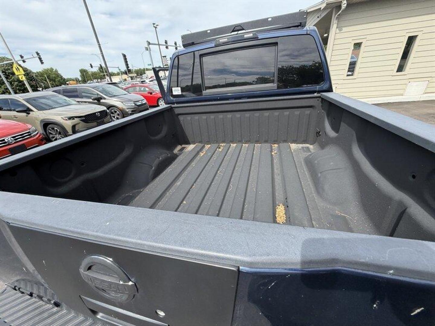 2010 Navy Blue Nissan Titan PRO-4X (1N6BA0EC7AN) with an 5.6L Flex Fuel V8 317hp 385ft. lbs. engine, Automatic transmission, located at 25355 Eames Street, Channahon, IL, 60410, (815) 467-1807, 41.429108, -88.228432 - Meet your next project with personality this 2010 Nissan Titan PRO-4X. And lets just get one thing straight right out the gate she is NOT a delicate little garage-kept princess. Shes more like that wild friend whos got stories, a little attitude, and absolutely zero apologies. This is a Texas truc - Photo#16