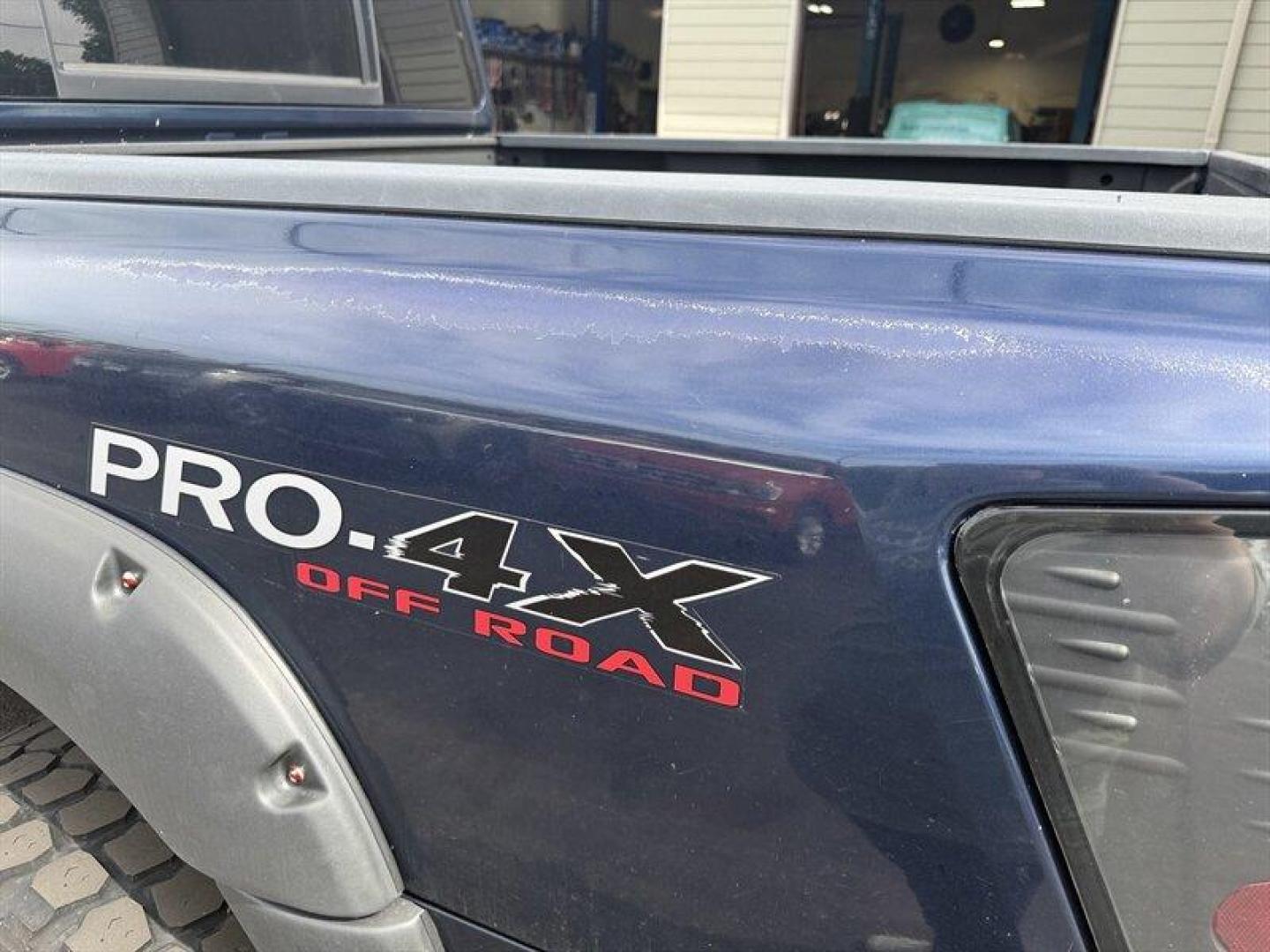 2010 Navy Blue Nissan Titan PRO-4X (1N6BA0EC7AN) with an 5.6L Flex Fuel V8 317hp 385ft. lbs. engine, Automatic transmission, located at 25355 Eames Street, Channahon, IL, 60410, (815) 467-1807, 41.429108, -88.228432 - Meet your next project with personality this 2010 Nissan Titan PRO-4X. And lets just get one thing straight right out the gate she is NOT a delicate little garage-kept princess. Shes more like that wild friend whos got stories, a little attitude, and absolutely zero apologies. This is a Texas truc - Photo#18