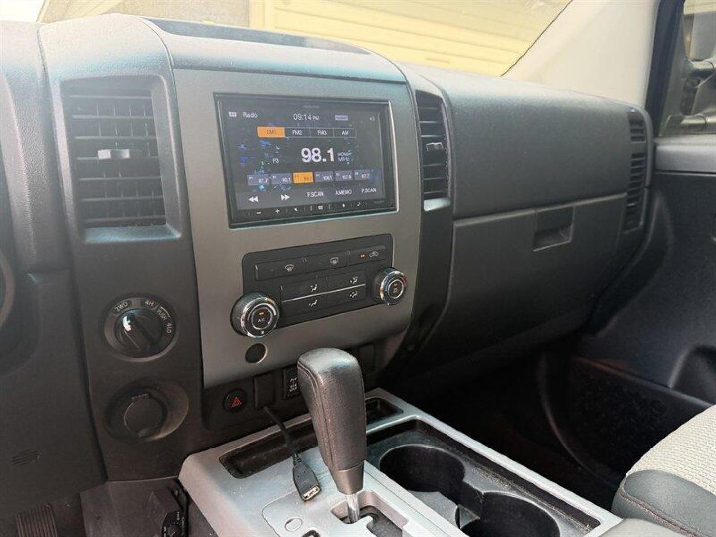 2010 Navy Blue Nissan Titan PRO-4X (1N6BA0EC7AN) with an 5.6L Flex Fuel V8 317hp 385ft. lbs. engine, Automatic transmission, located at 25355 Eames Street, Channahon, IL, 60410, (815) 467-1807, 41.429108, -88.228432 - Meet your next project with personality this 2010 Nissan Titan PRO-4X. And lets just get one thing straight right out the gate she is NOT a delicate little garage-kept princess. Shes more like that wild friend whos got stories, a little attitude, and absolutely zero apologies. This is a Texas truc - Photo#21
