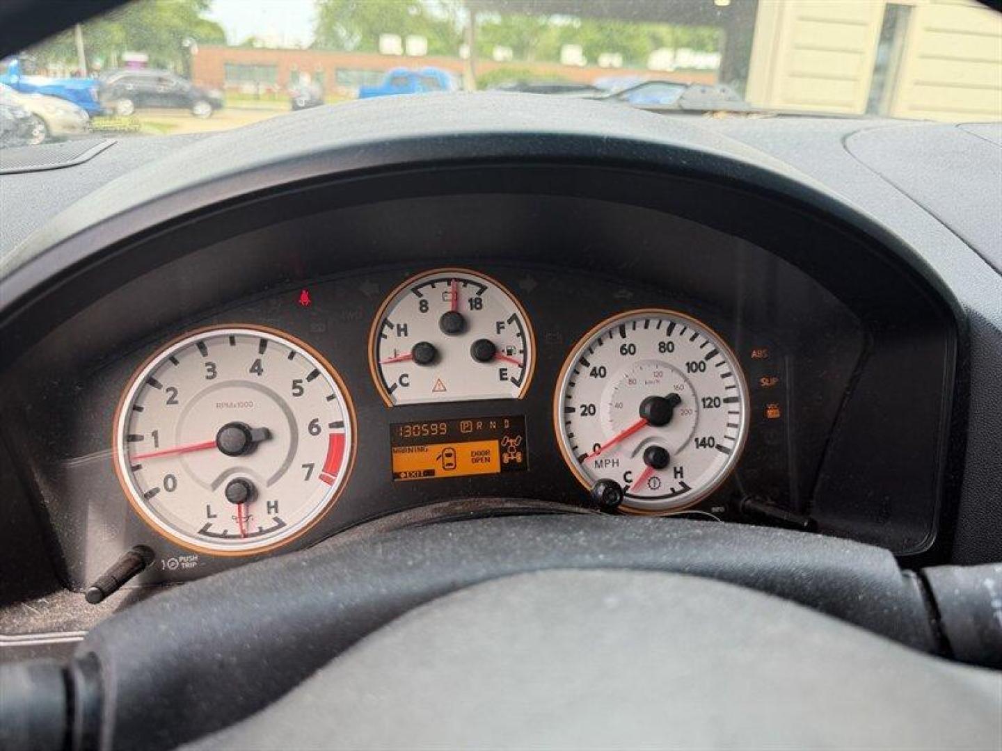 2010 Navy Blue Nissan Titan PRO-4X (1N6BA0EC7AN) with an 5.6L Flex Fuel V8 317hp 385ft. lbs. engine, Automatic transmission, located at 25355 Eames Street, Channahon, IL, 60410, (815) 467-1807, 41.429108, -88.228432 - Meet your next project with personality this 2010 Nissan Titan PRO-4X. And lets just get one thing straight right out the gate she is NOT a delicate little garage-kept princess. Shes more like that wild friend whos got stories, a little attitude, and absolutely zero apologies. This is a Texas truc - Photo#23