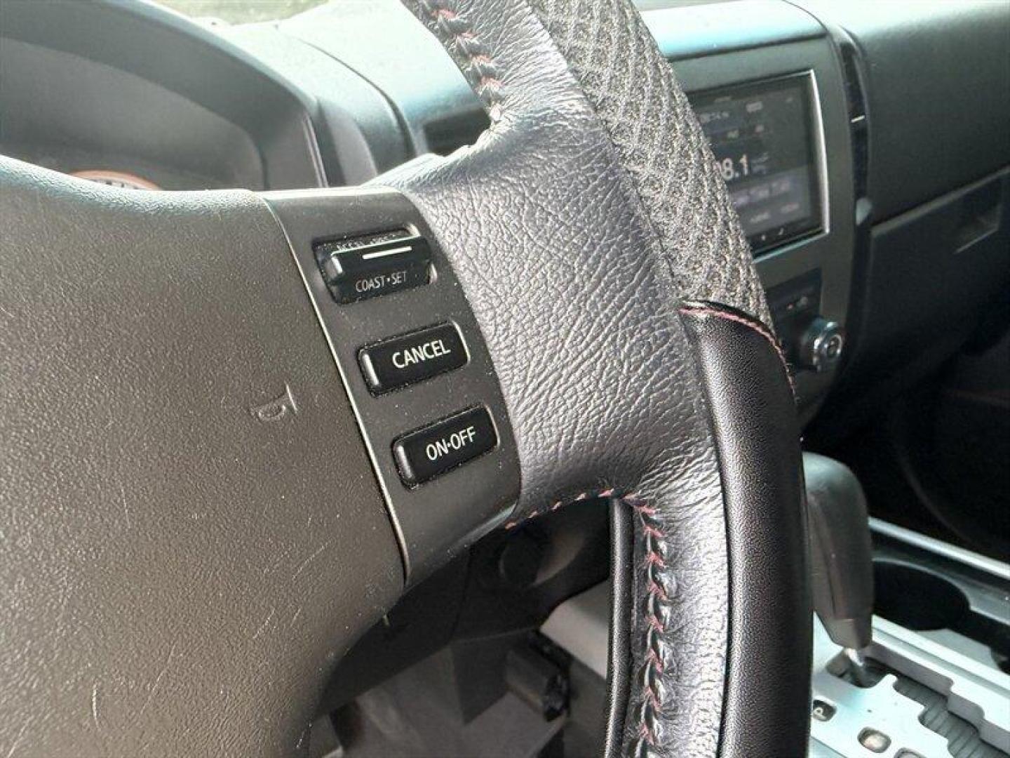 2010 Navy Blue Nissan Titan PRO-4X (1N6BA0EC7AN) with an 5.6L Flex Fuel V8 317hp 385ft. lbs. engine, Automatic transmission, located at 25355 Eames Street, Channahon, IL, 60410, (815) 467-1807, 41.429108, -88.228432 - Meet your next project with personality this 2010 Nissan Titan PRO-4X. And lets just get one thing straight right out the gate she is NOT a delicate little garage-kept princess. Shes more like that wild friend whos got stories, a little attitude, and absolutely zero apologies. This is a Texas truc - Photo#24