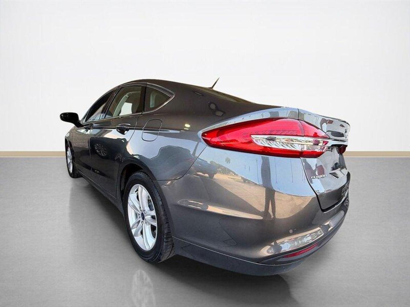 2018 Magnetic Ford Fusion SE (3FA6P0HD8JR) with an EcoBoost 1.5L Turbo I4 181hp 185ft. lbs. engine, Automatic transmission, located at 25355 Eames Street, Channahon, IL, 60410, (815) 467-1807, 41.429108, -88.228432 - Clean local trade with only 65,000 miles and ready to save you money at the pump without sacrificing style. Smooth ride, sharp looks, and the kind of sedan that still turns heads in a parking lot. Perfect daily driver energy with comfort, reliability, and great MPG all wrapped into one sleek packag - Photo#5