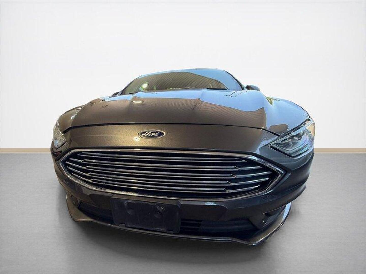 2018 Magnetic Ford Fusion SE (3FA6P0HD8JR) with an EcoBoost 1.5L Turbo I4 181hp 185ft. lbs. engine, Automatic transmission, located at 25355 Eames Street, Channahon, IL, 60410, (815) 467-1807, 41.429108, -88.228432 - Clean local trade with only 65,000 miles and ready to save you money at the pump without sacrificing style. Smooth ride, sharp looks, and the kind of sedan that still turns heads in a parking lot. Perfect daily driver energy with comfort, reliability, and great MPG all wrapped into one sleek packag - Photo#8