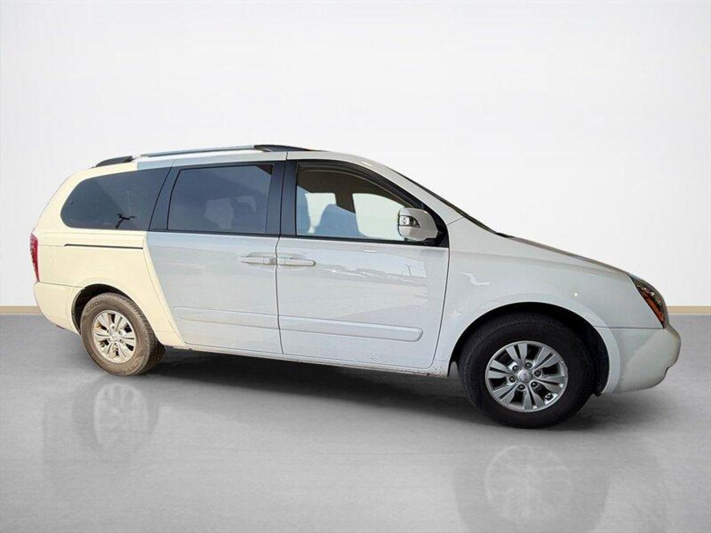 2012 Clear White Kia Sedona LX (KNDMG4C70C6) with an 3.5 engine, Automatic transmission, located at 25355 Eames Street, Channahon, IL, 60410, (815) 467-1807, 41.429108, -88.228432 - The kind of van that says Ive been babied, not battled. One-owner, low-mile, local trade owned by an older couple its whole life this Sedona has lived the easy life. Power doors, backup camera, bucket seats, and plenty of room for kids, groceries, road trips, or whatever chaos life throws in the b - Photo#1