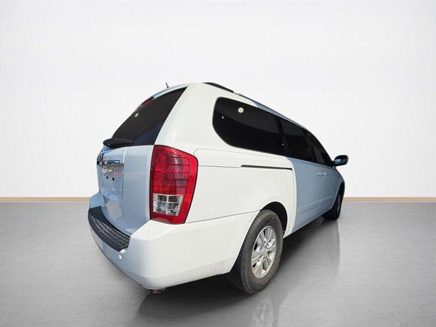2012 Clear White Kia Sedona LX (KNDMG4C70C6) with an 3.5 engine, Automatic transmission, located at 25355 Eames Street, Channahon, IL, 60410, (815) 467-1807, 41.429108, -88.228432 - The kind of van that says Ive been babied, not battled. One-owner, low-mile, local trade owned by an older couple its whole life this Sedona has lived the easy life. Power doors, backup camera, bucket seats, and plenty of room for kids, groceries, road trips, or whatever chaos life throws in the b - Photo#3