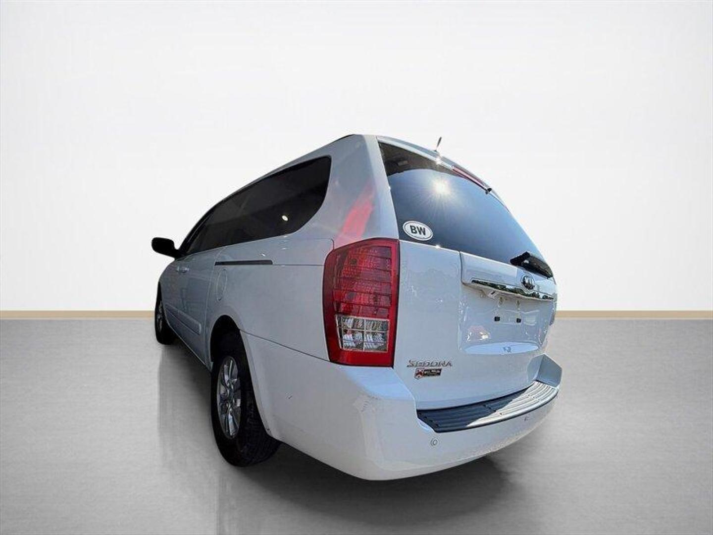 2012 Clear White Kia Sedona LX (KNDMG4C70C6) with an 3.5 engine, Automatic transmission, located at 25355 Eames Street, Channahon, IL, 60410, (815) 467-1807, 41.429108, -88.228432 - The kind of van that says Ive been babied, not battled. One-owner, low-mile, local trade owned by an older couple its whole life this Sedona has lived the easy life. Power doors, backup camera, bucket seats, and plenty of room for kids, groceries, road trips, or whatever chaos life throws in the b - Photo#5