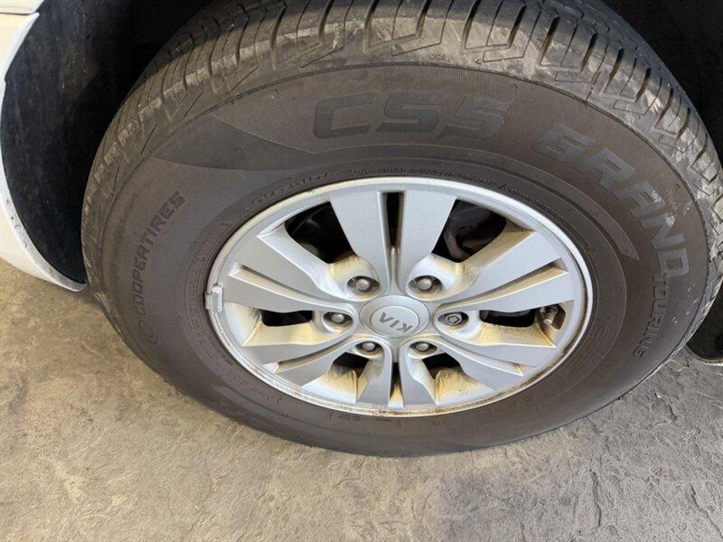 2012 Clear White Kia Sedona LX (KNDMG4C70C6) with an 3.5 engine, Automatic transmission, located at 25355 Eames Street, Channahon, IL, 60410, (815) 467-1807, 41.429108, -88.228432 - The kind of van that says Ive been babied, not battled. One-owner, low-mile, local trade owned by an older couple its whole life this Sedona has lived the easy life. Power doors, backup camera, bucket seats, and plenty of room for kids, groceries, road trips, or whatever chaos life throws in the b - Photo#9