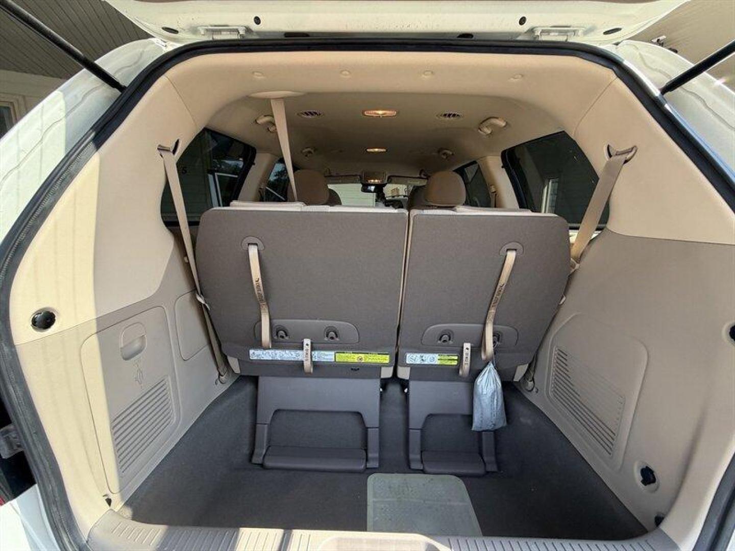 2012 Clear White Kia Sedona LX (KNDMG4C70C6) with an 3.5 engine, Automatic transmission, located at 25355 Eames Street, Channahon, IL, 60410, (815) 467-1807, 41.429108, -88.228432 - The kind of van that says Ive been babied, not battled. One-owner, low-mile, local trade owned by an older couple its whole life this Sedona has lived the easy life. Power doors, backup camera, bucket seats, and plenty of room for kids, groceries, road trips, or whatever chaos life throws in the b - Photo#12