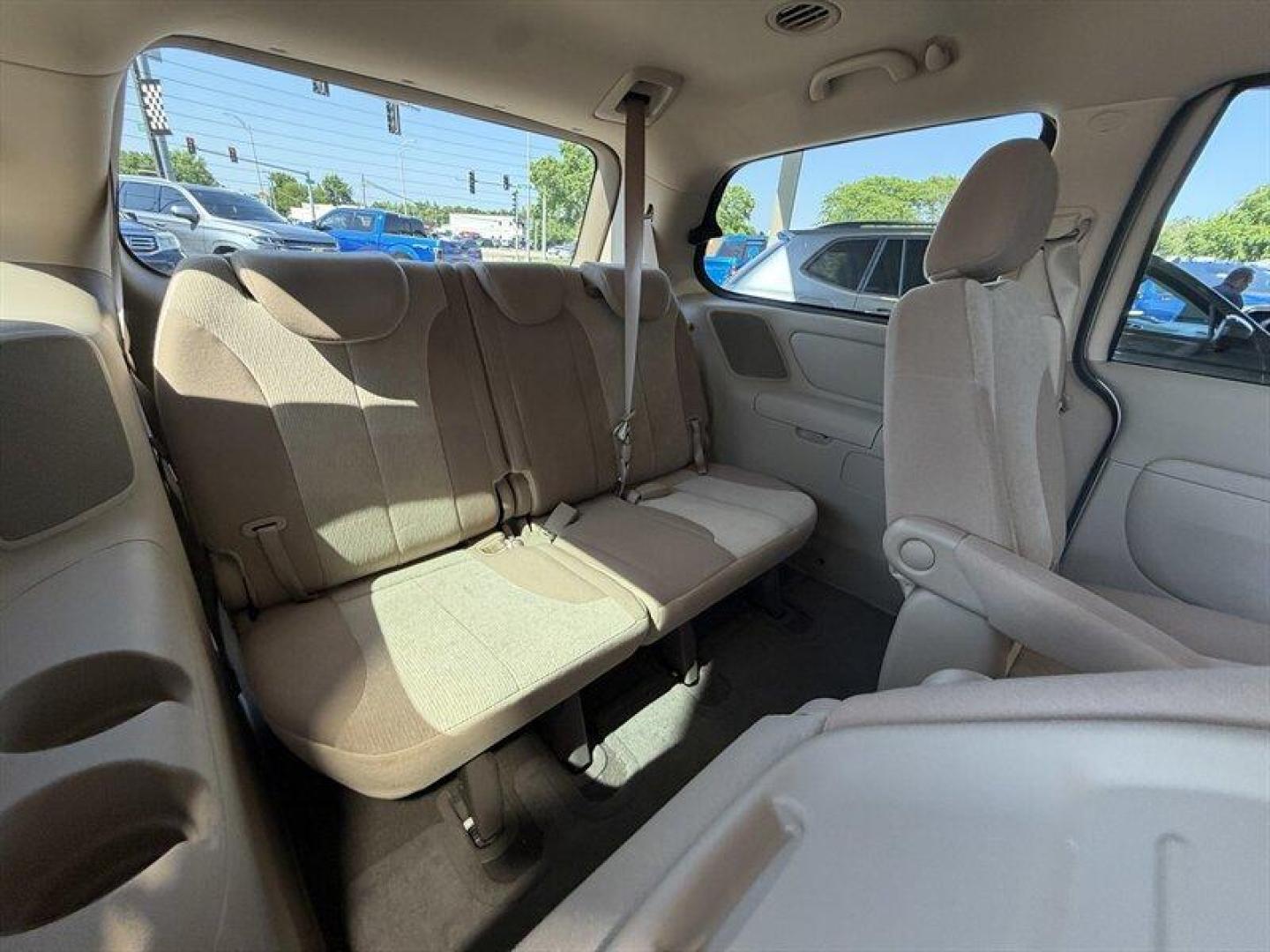 2012 Clear White Kia Sedona LX (KNDMG4C70C6) with an 3.5 engine, Automatic transmission, located at 25355 Eames Street, Channahon, IL, 60410, (815) 467-1807, 41.429108, -88.228432 - The kind of van that says Ive been babied, not battled. One-owner, low-mile, local trade owned by an older couple its whole life this Sedona has lived the easy life. Power doors, backup camera, bucket seats, and plenty of room for kids, groceries, road trips, or whatever chaos life throws in the b - Photo#14
