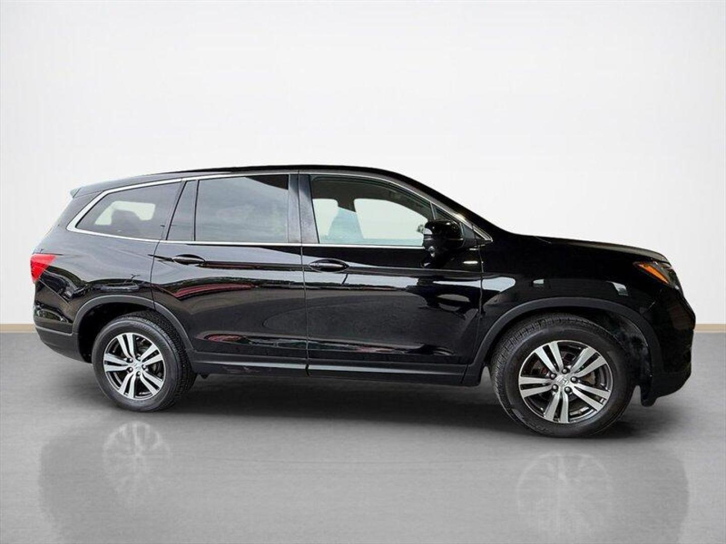 2016 Crystal Black Pearl Honda Pilot EX (5FNYF6H32GB) with an 3.5L V6 280hp 262ft. lbs. engine, Automatic transmission, located at 25355 Eames Street, Channahon, IL, 60410, (815) 467-1807, 41.429108, -88.228432 - Clean local trade thats been well cared for and ready for the next family adventure. 7-passenger seating, backup camera, AWD confidence, and that legendary Honda reputation everyone wants when it comes to reliability. Spacious enough for the kids, sports gear, grocery runs, road trips all without - Photo#1