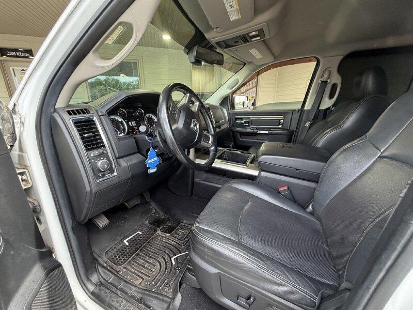 2014 Bright White Clear Coat/Bright Silver Metallic Cle RAM 1500 Laramie (1C6RR6JG8ES) with an 3.6L Flex Fuel V6 305hp 269ft. lbs. engine, Automatic transmission, located at 25355 Eames Street, Channahon, IL, 60410, (815) 467-1807, 41.429108, -88.228432 - Heres the honest deal truck. Laramie package with leather, 4x4, and the V6 engine but this one is being sold AS-IS AS SHOWN and priced accordingly. What it needs: Rust repair Tires Brakes SES light on for an EVAP leak Not a showroom queen but if you need a cheap 4x4, a work truck, winter beater - Photo#11